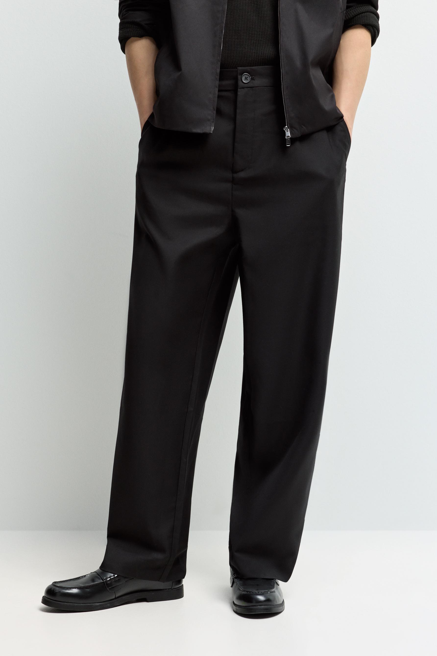Baggy trousers with darts — BLACK