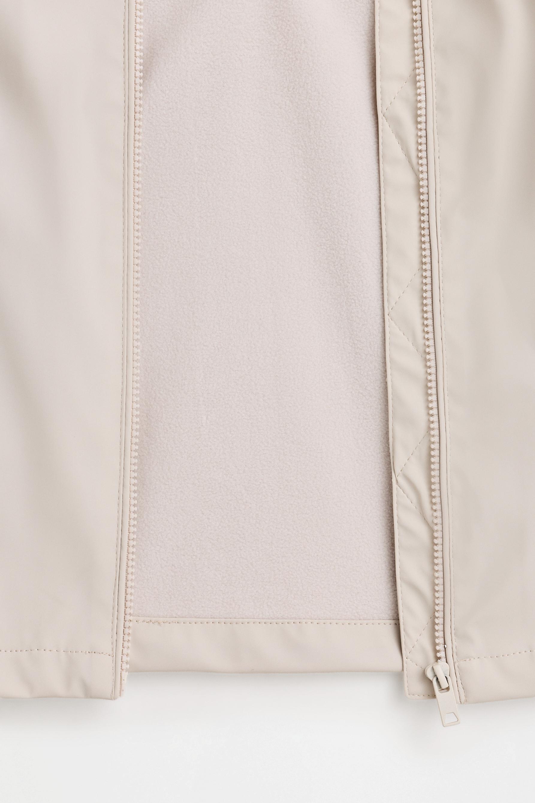 Lightweight rubberised long parka — ECRU