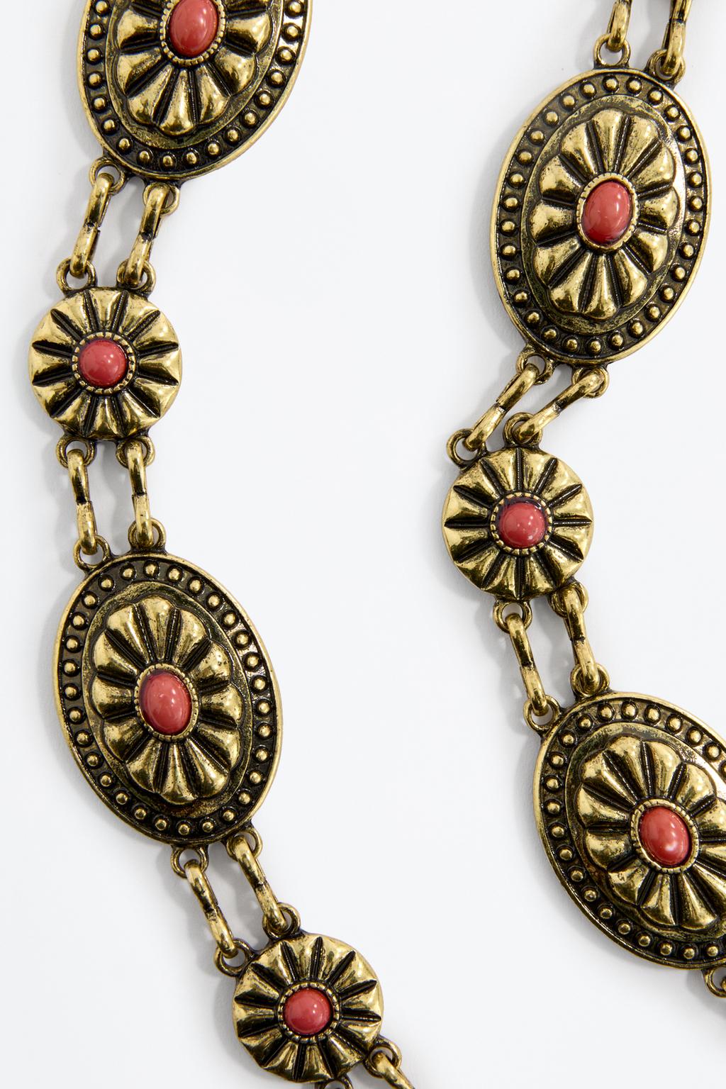 Cinturón metálico piedras