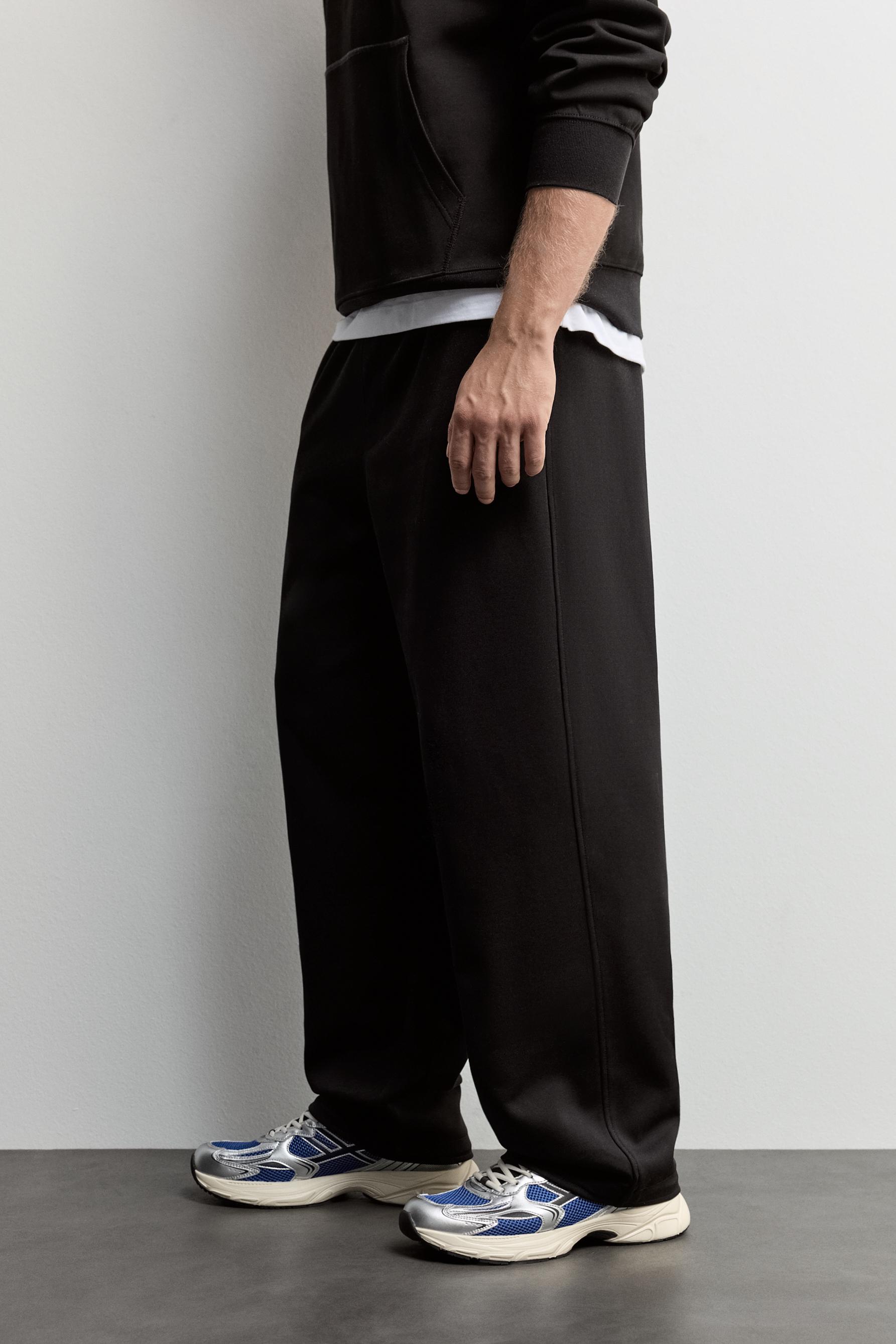 Interlock baggy joggers — BLACK