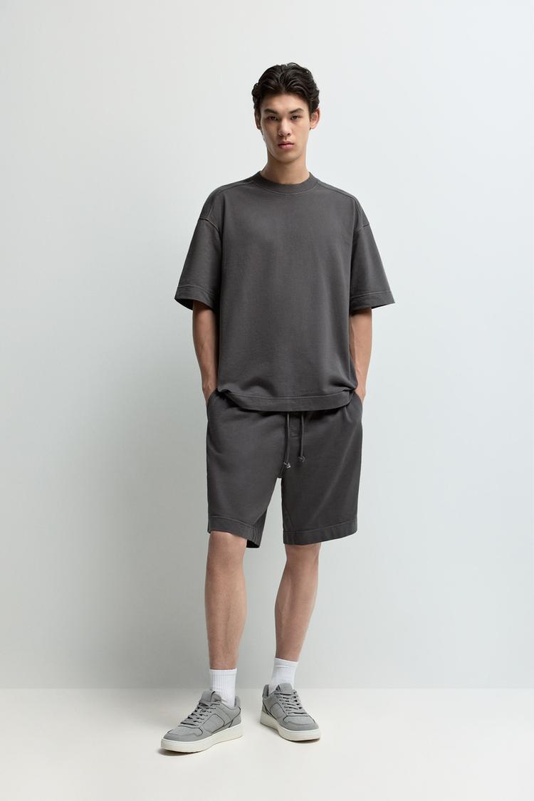 Faded-effect tracksuit Bermuda shorts — BLACK