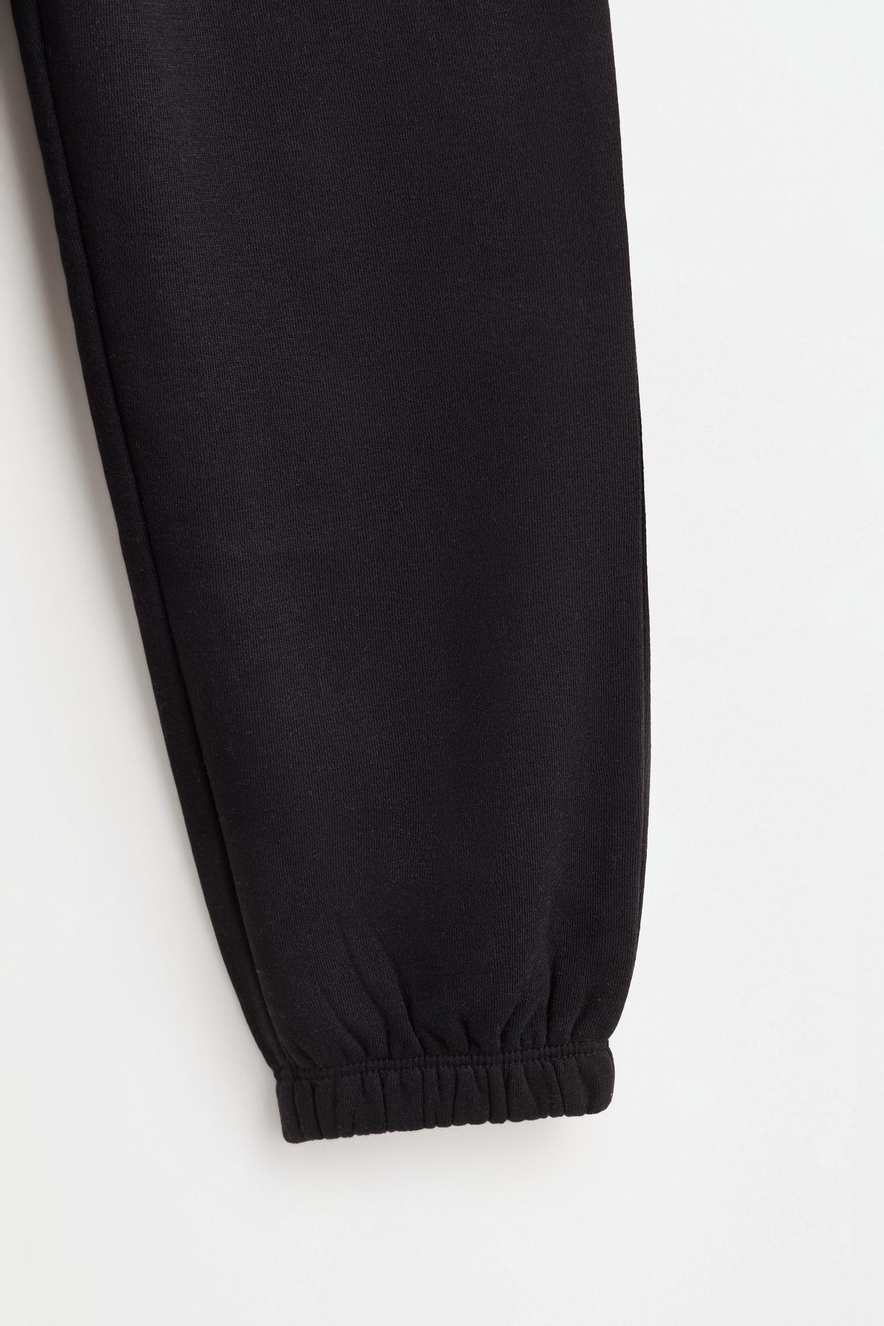 Solid plush trousers — BLACK