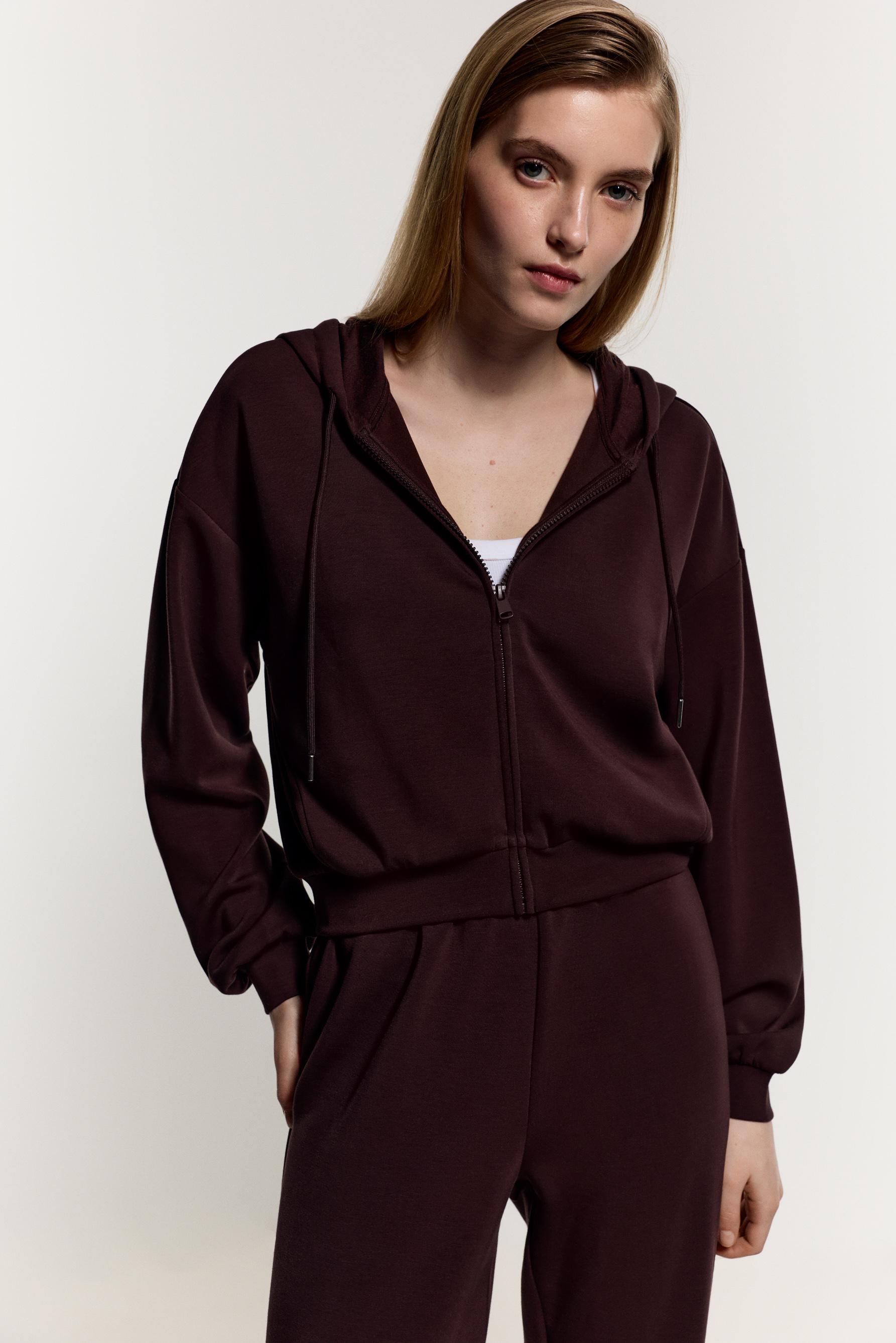 Sudadera cremallera fluida cuello capucha