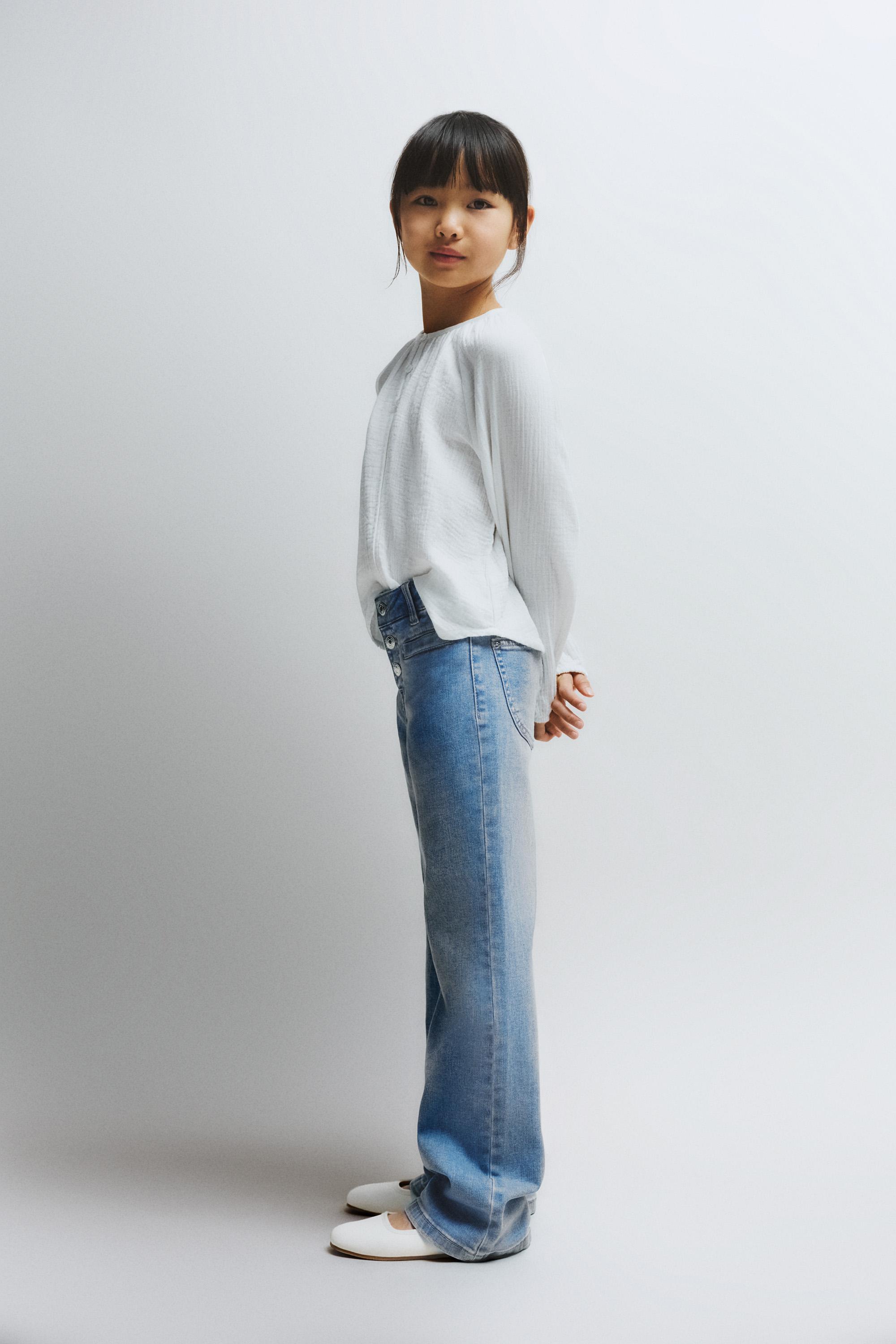 Bell bottom jeans with buttons — PALE BLUE