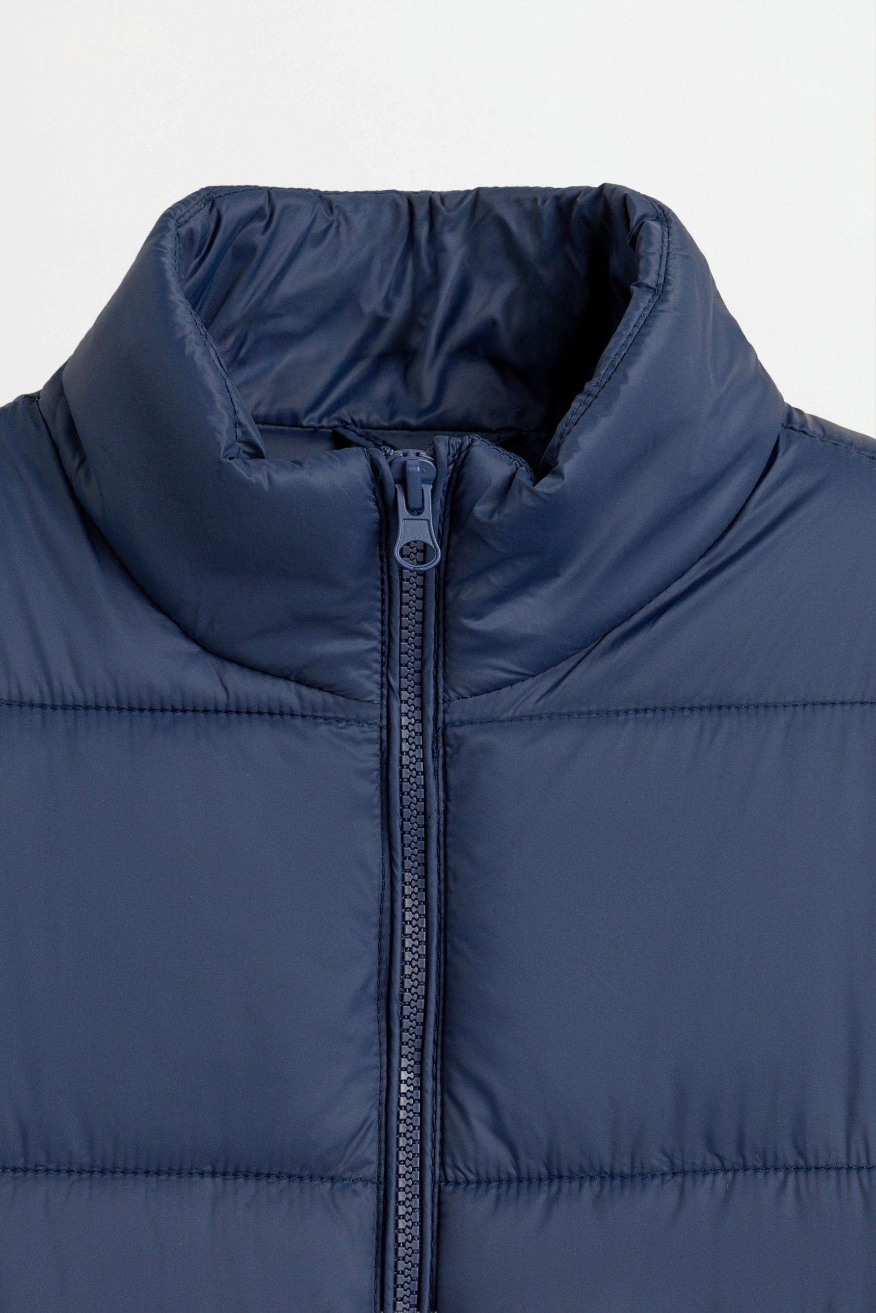Quilted jacket with interlock sleeves — BLUE