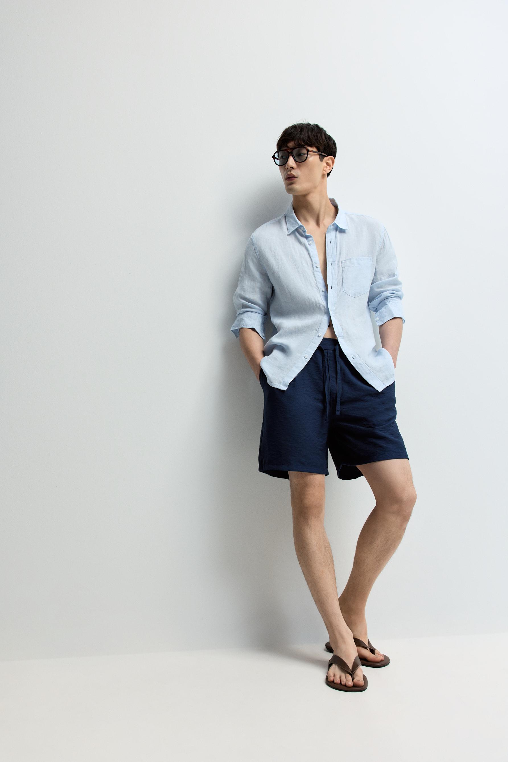Flowing pleated Bermuda shorts — NAVY