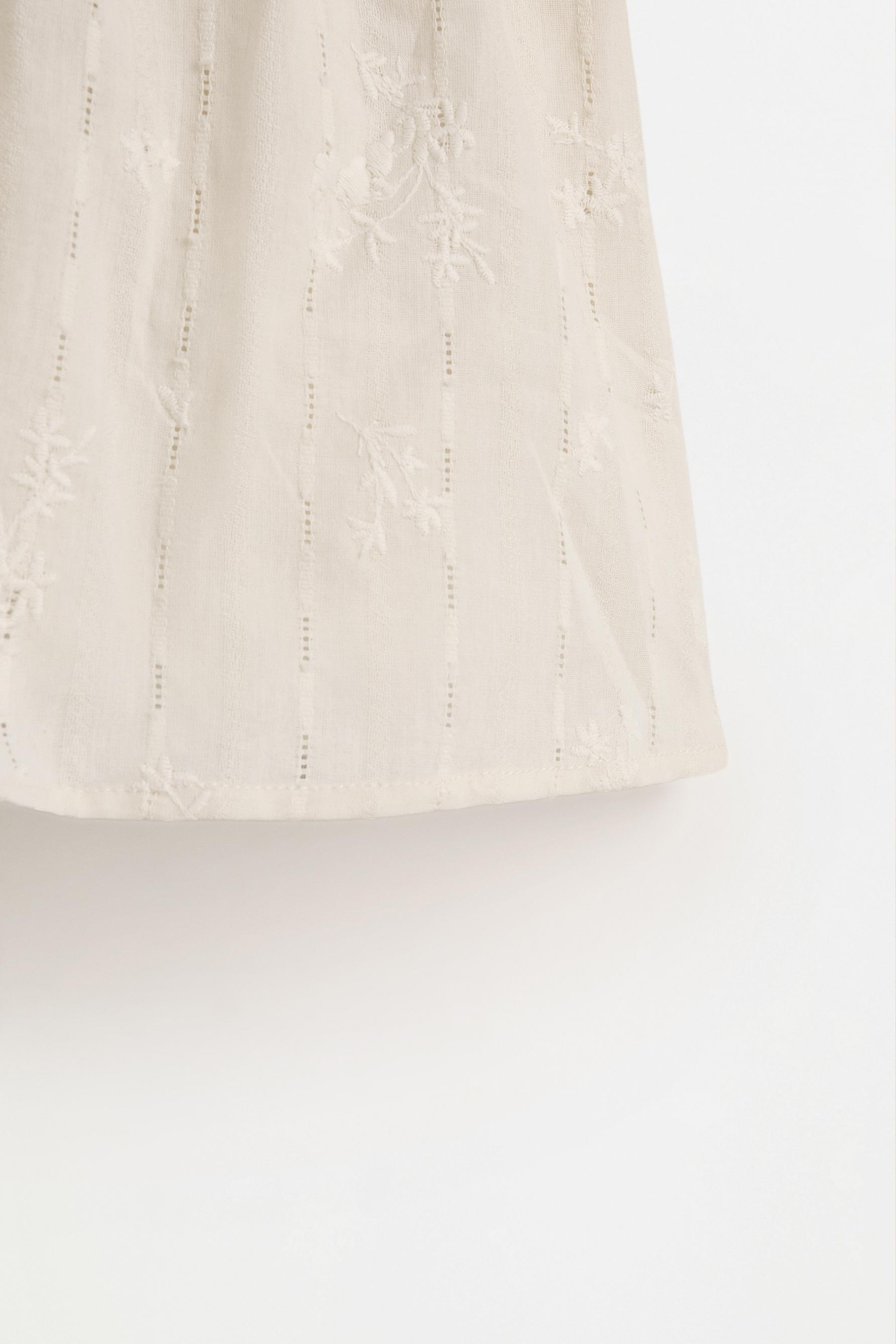 Embroidered blouse — SAND