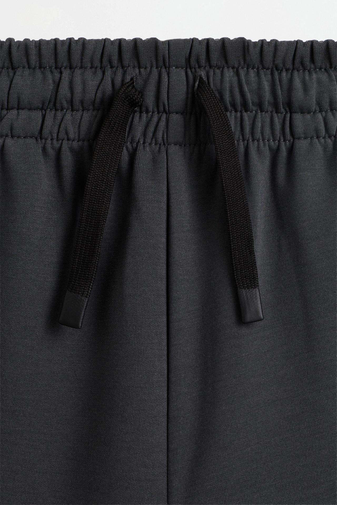 Neoprene-effect trousers — BLACK