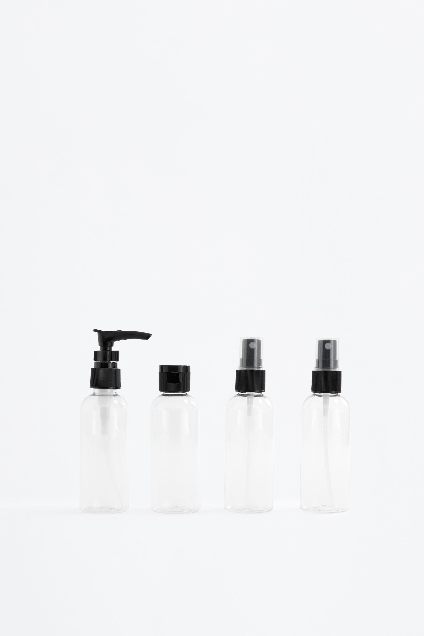 7-piece reusable travel bottle set — BLACK