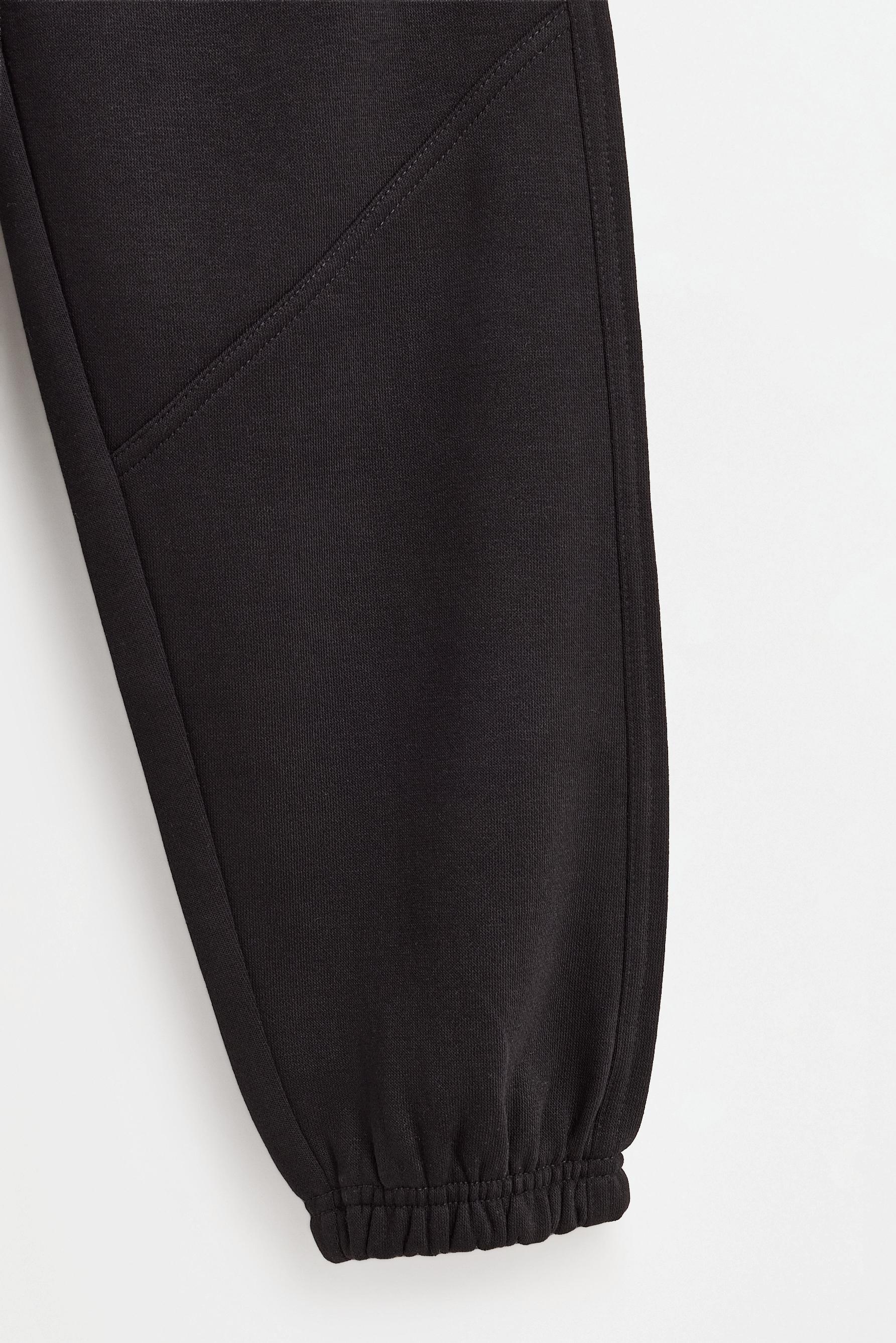 Plush trousers with seam detail — BLACK