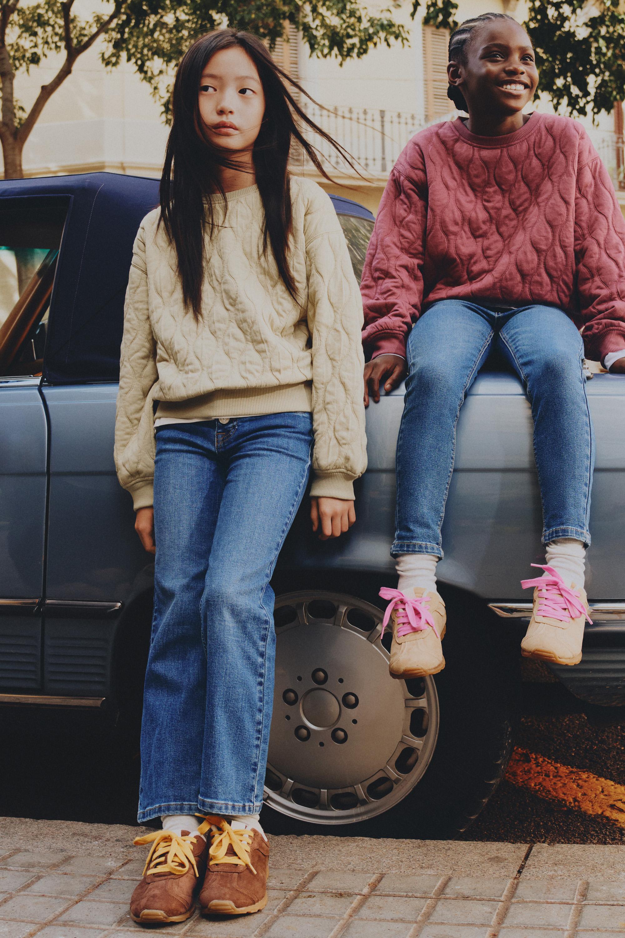 Bell bottom jeans with buttons — PALE BLUE