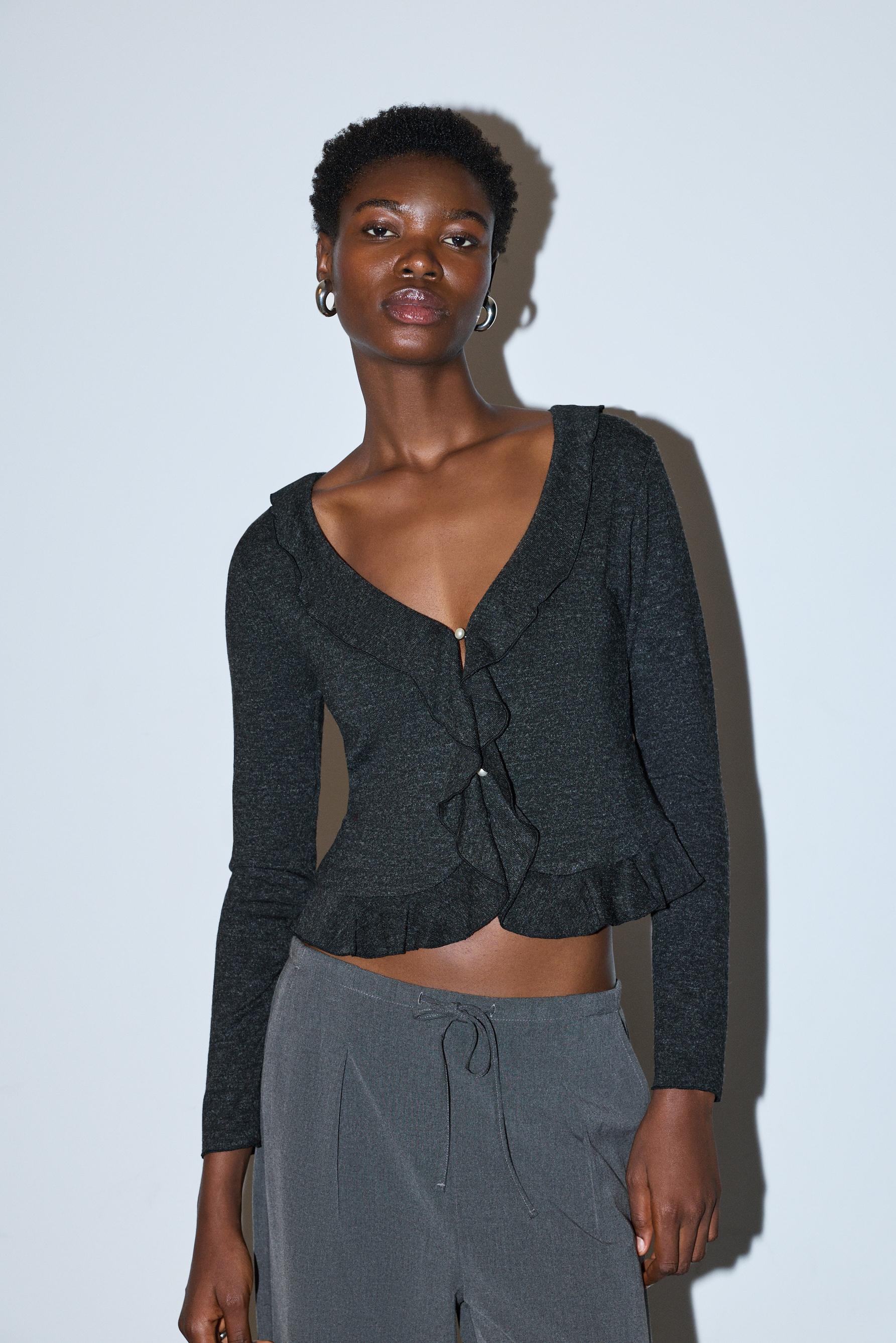 Chaqueta volantes punto cortado