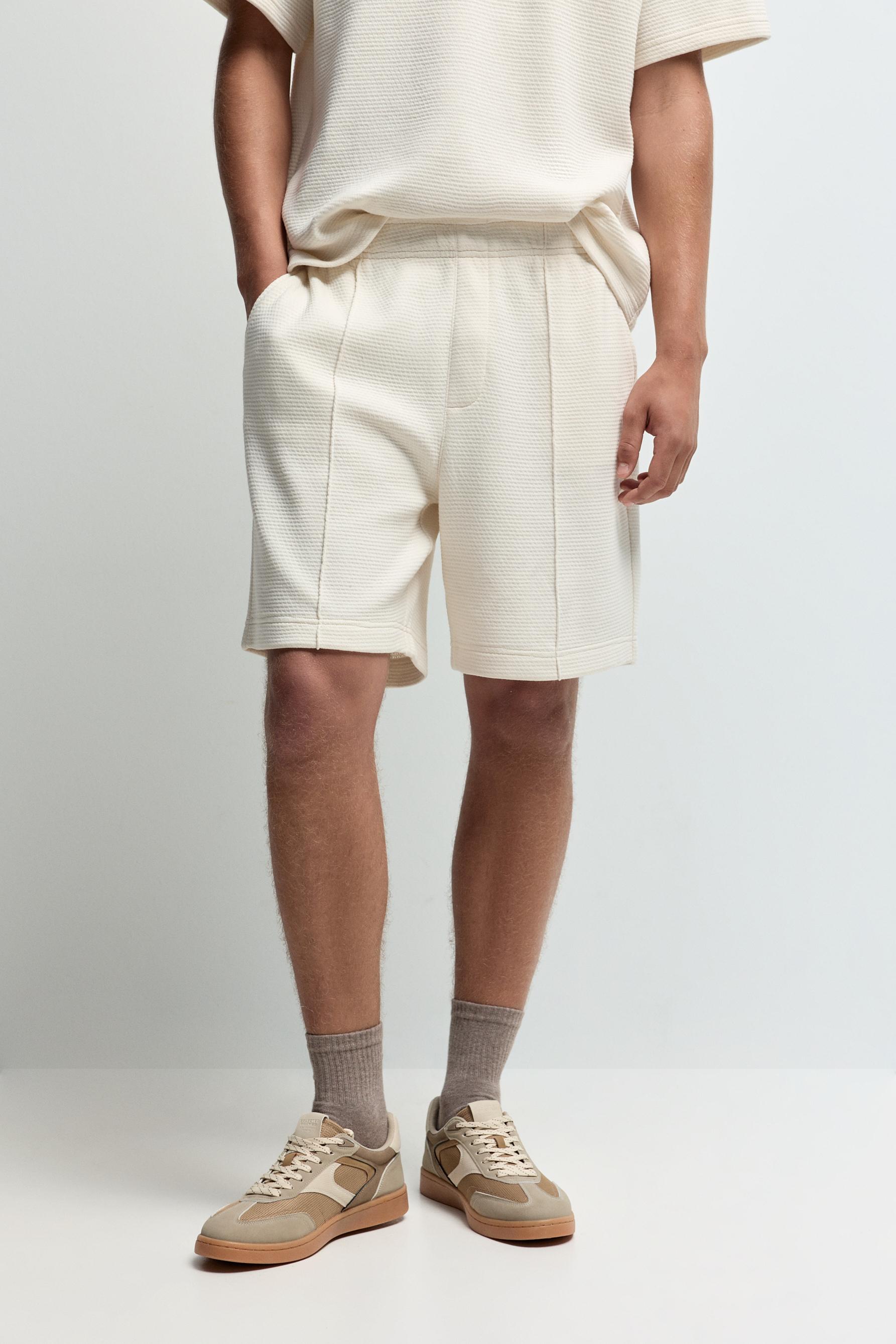 Waffle-textured Bermuda shorts — ECRU