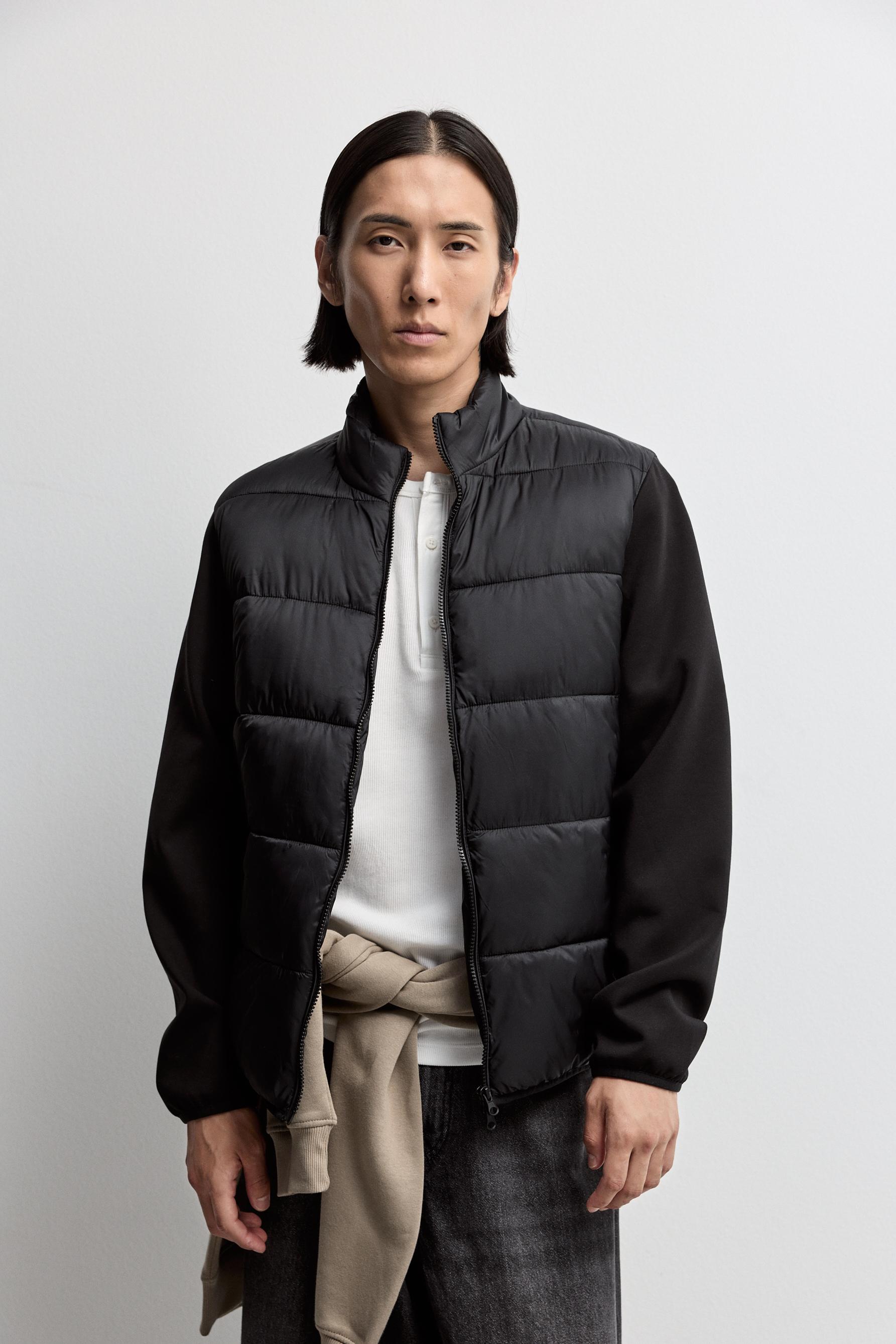 Quilted jacket with interlock sleeves — BLACK