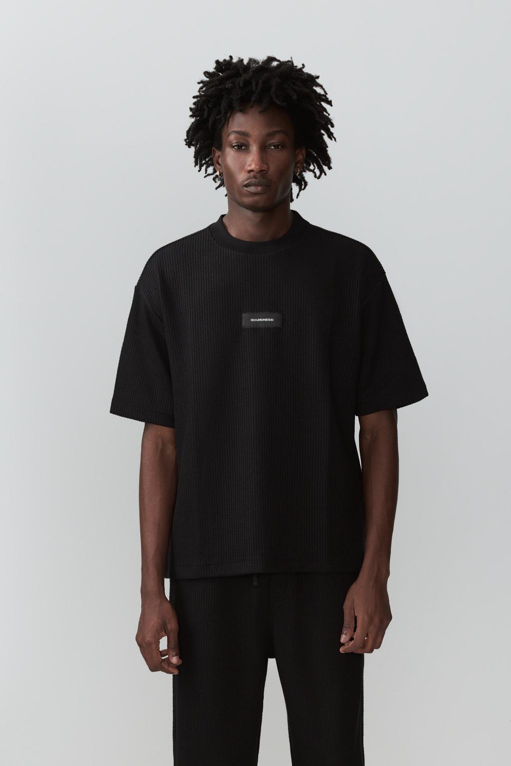 Textured T-shirt with label