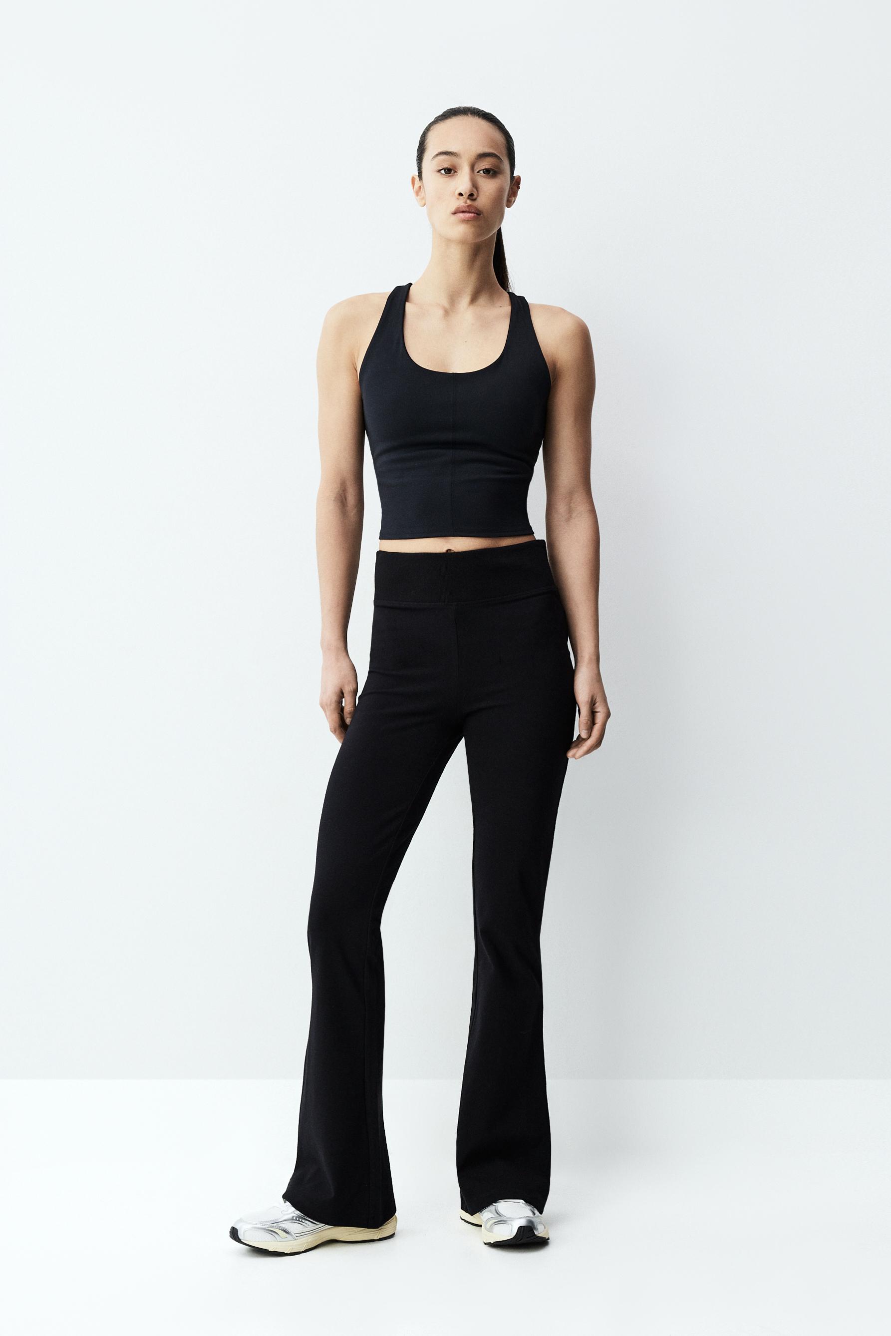 Bell bottom leggings with ribbed waist — BLACK