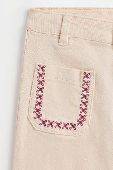 Embroidered bell bottom trousers — BEIGE 3