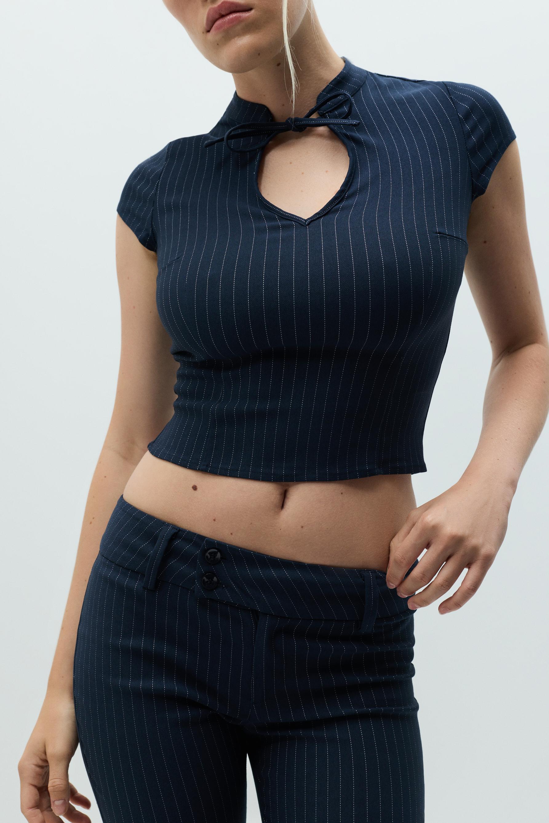 Striped bell bottom trousers — NAVY
