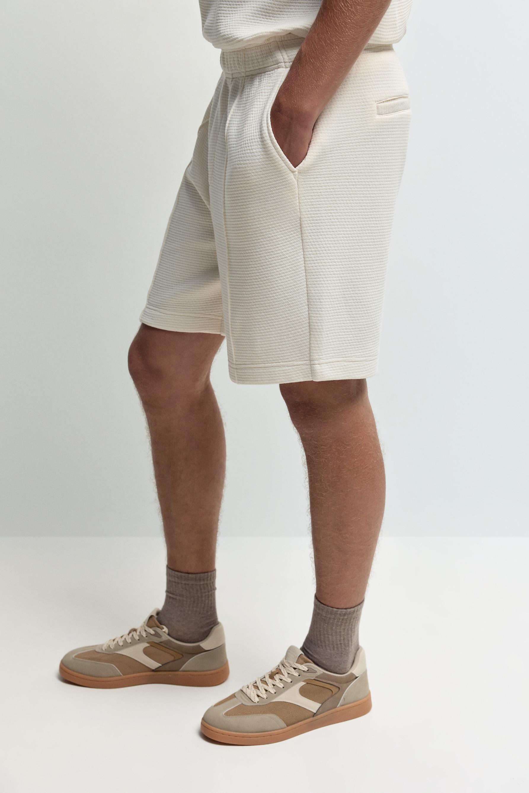 Waffle-textured Bermuda shorts — ECRU