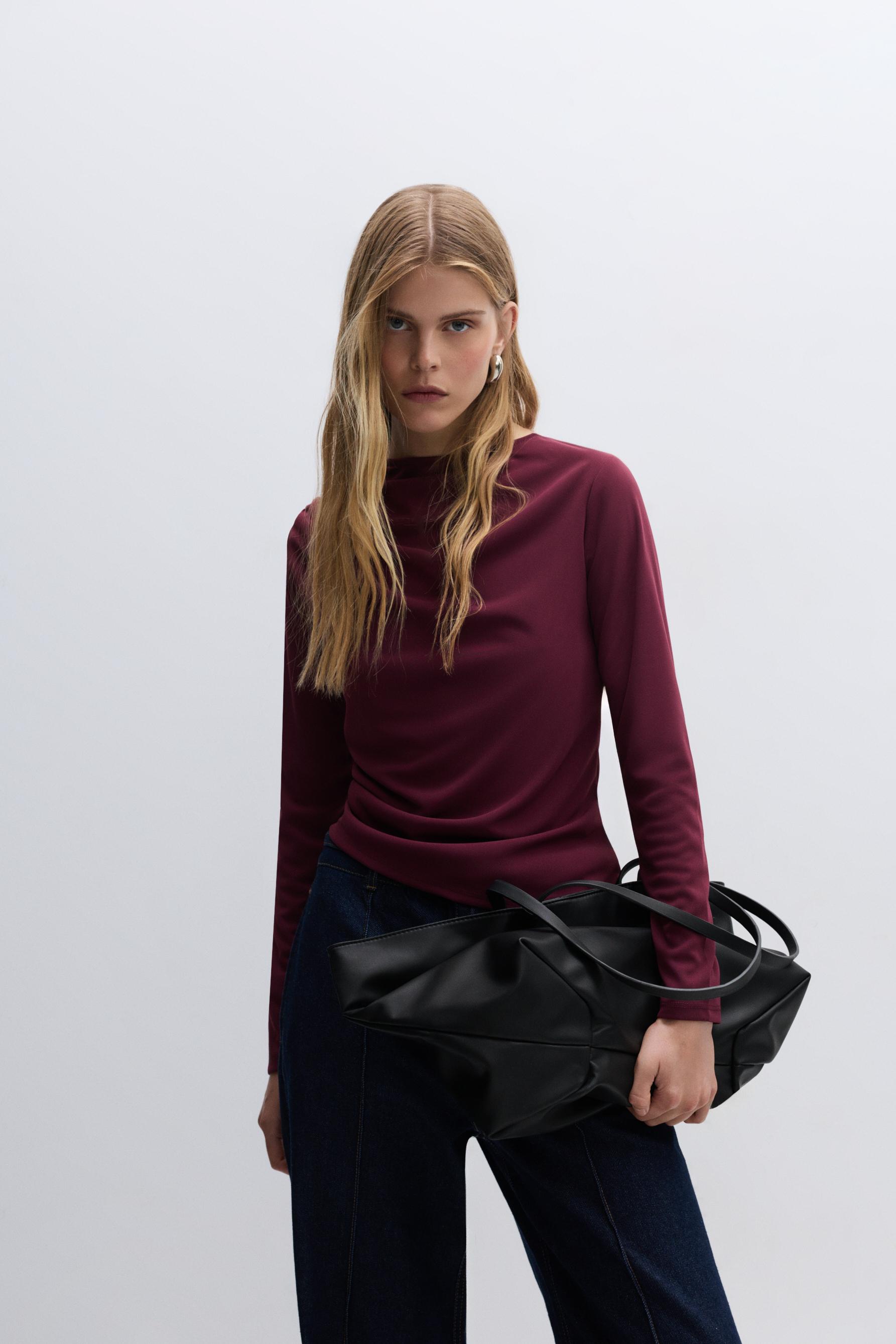 Top asimétrico manga larga