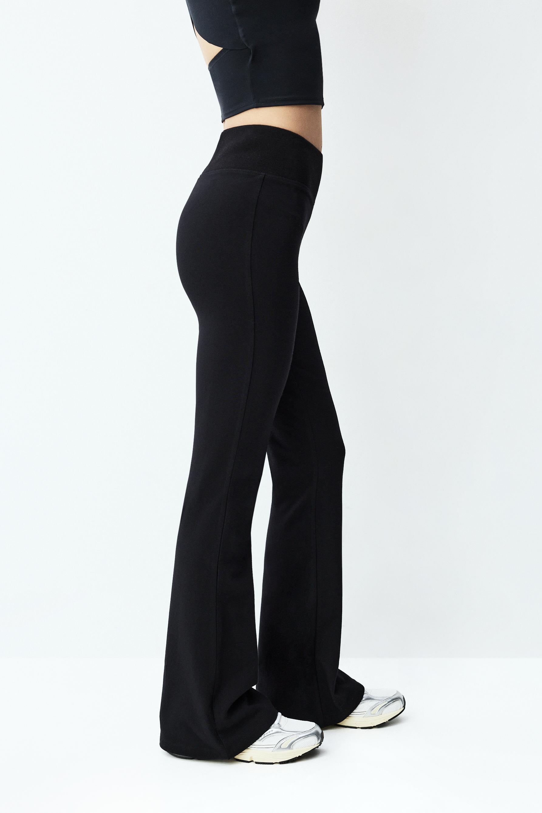 Bell bottom leggings with ribbed waist — BLACK