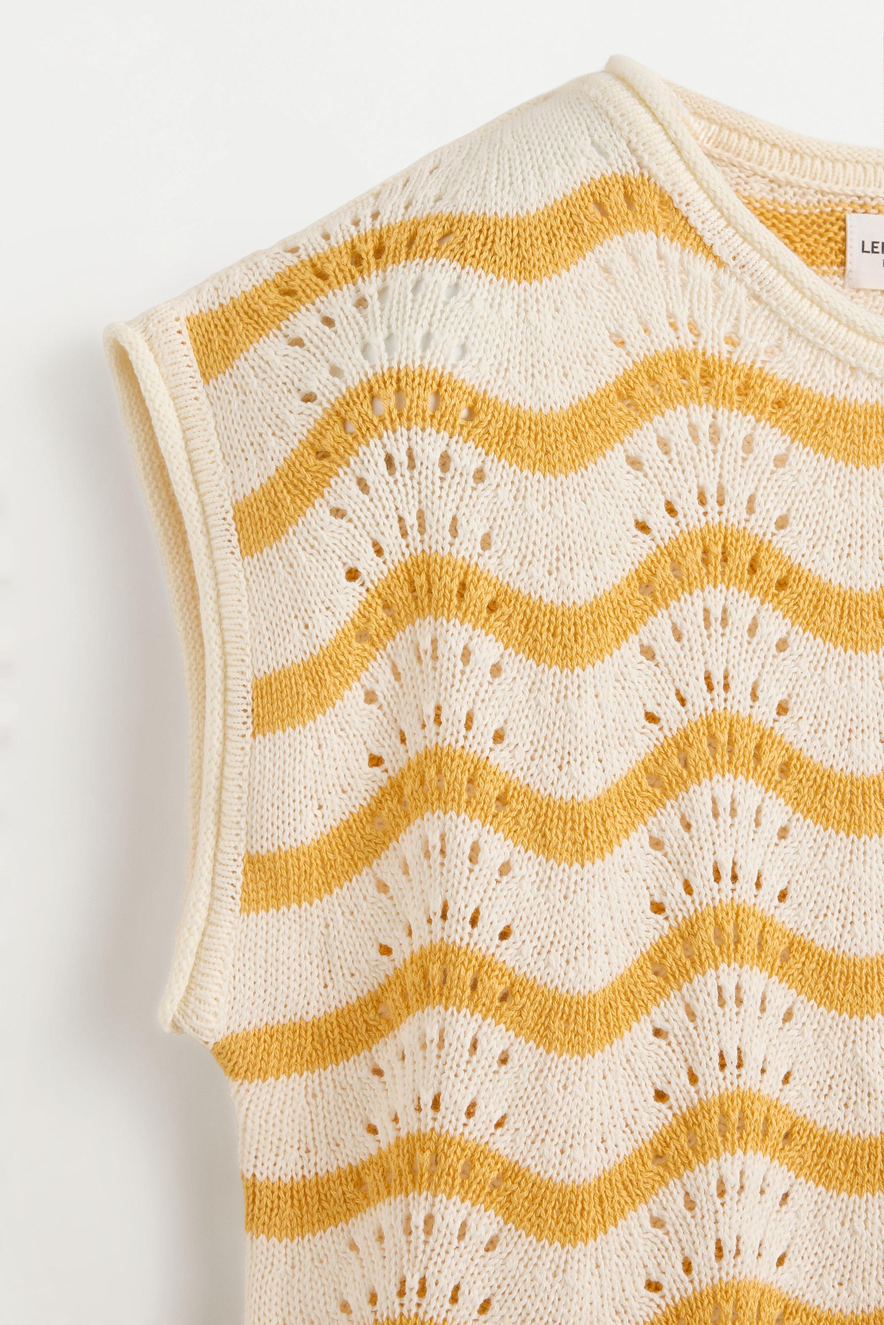 Wavy cutwork knit top — MUSTARD