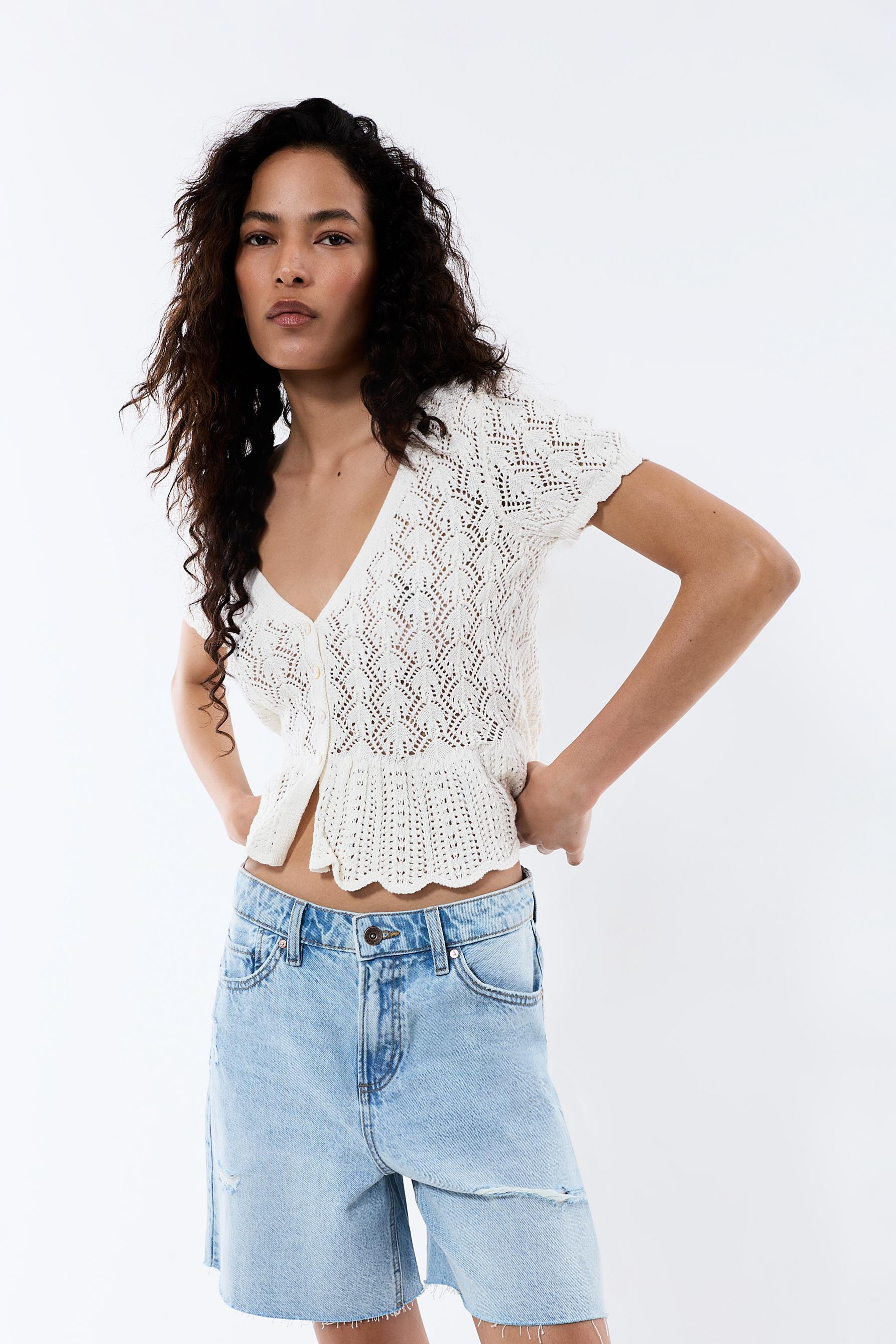 Top punto calado peplum