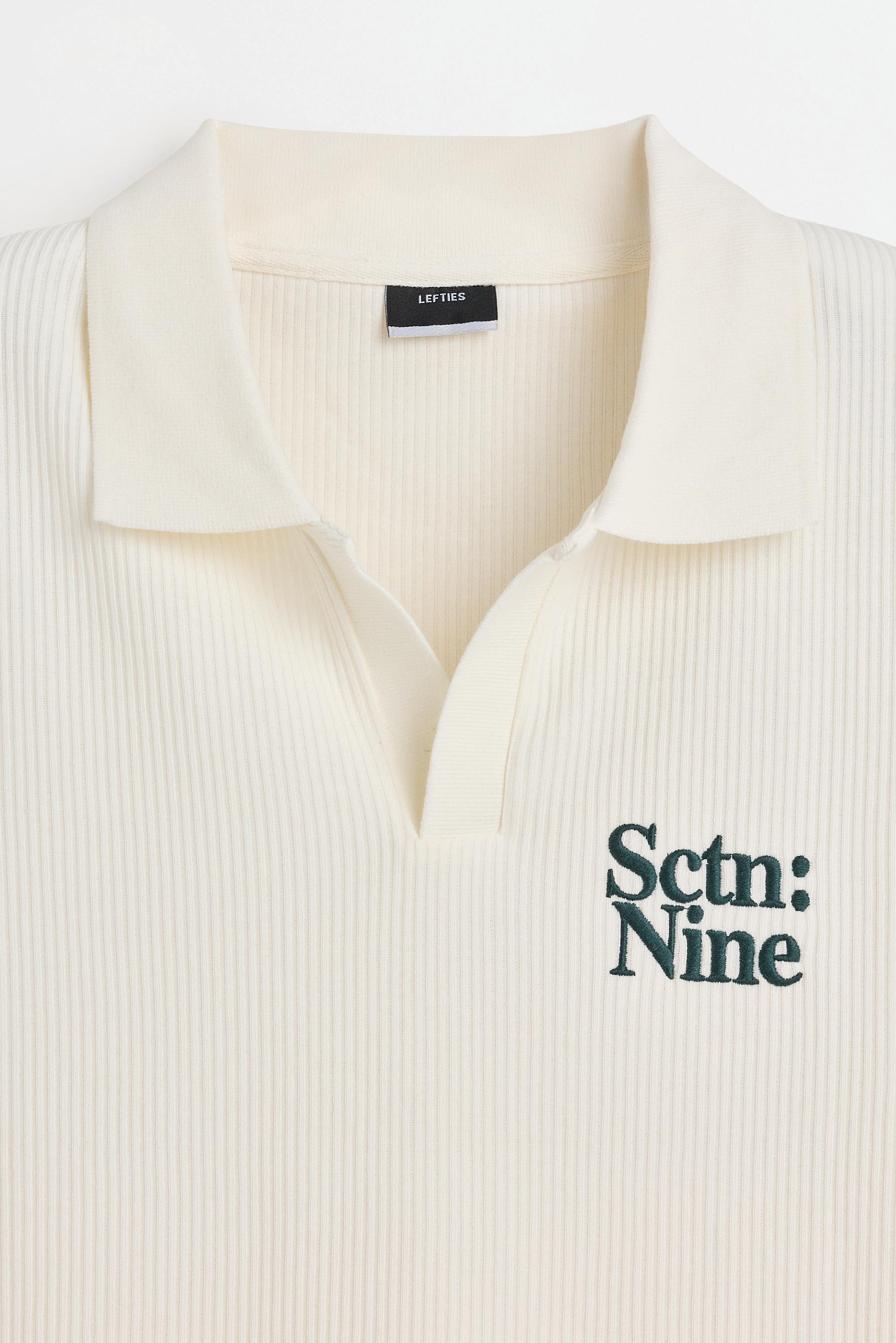 Ribbed embroidered polo shirt — OFF WHITE