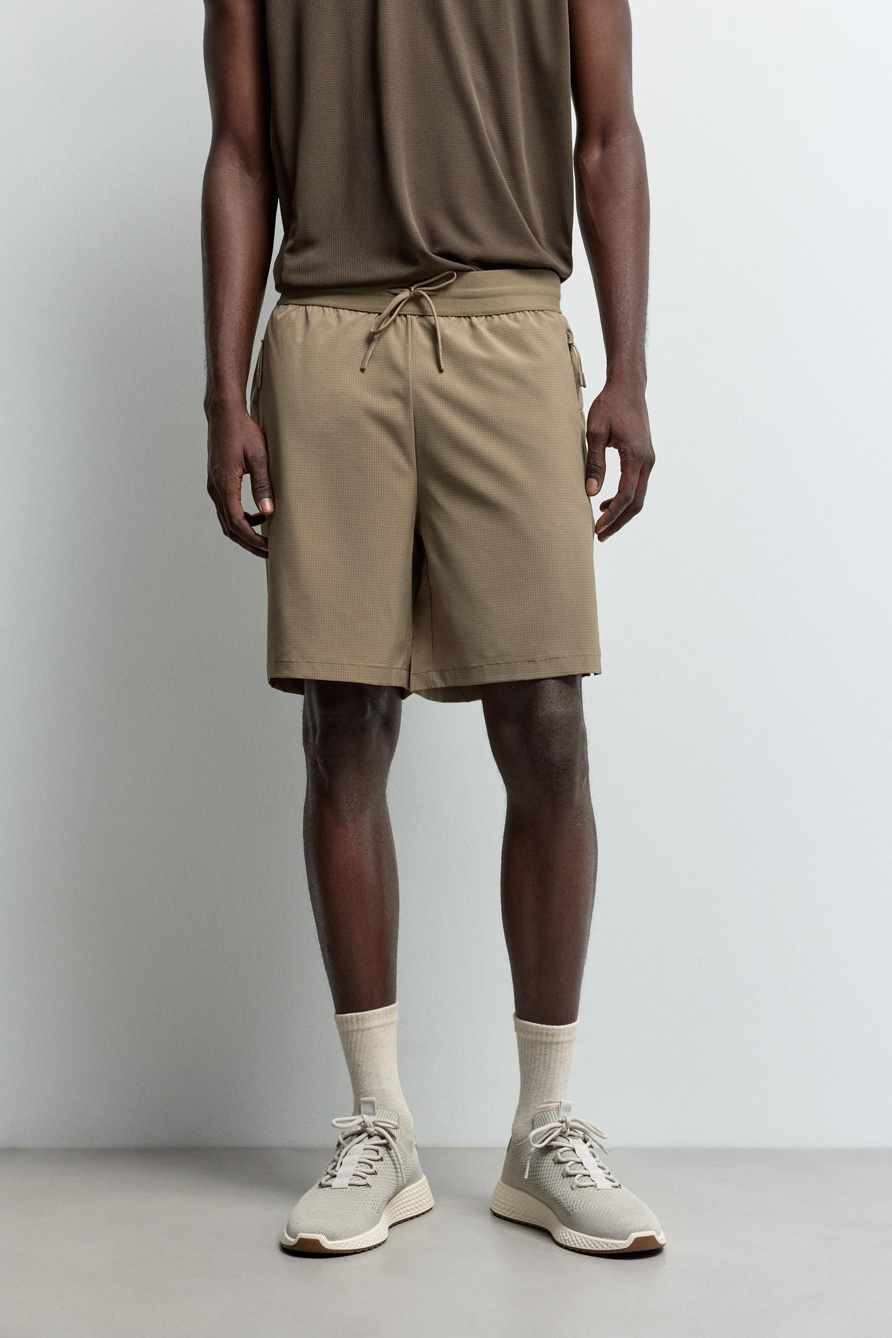 Bermuda sports shorts — MINK