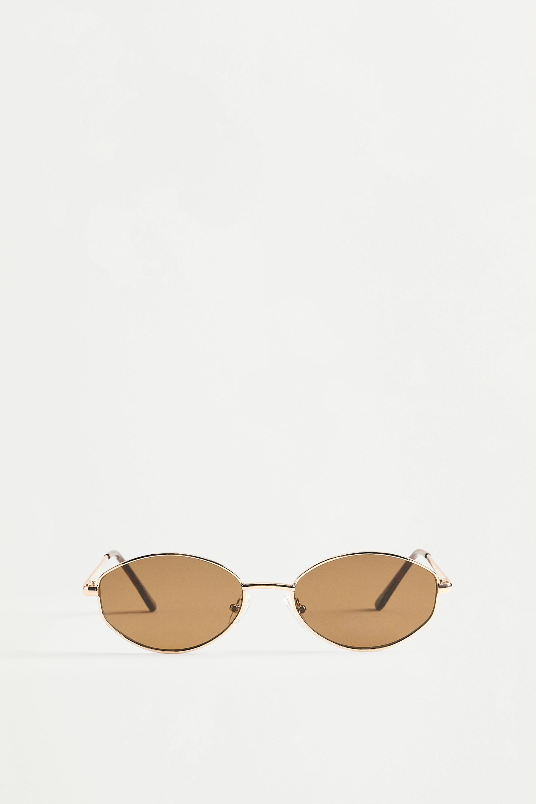 Irregular oval metallic sunglasses — GOLD