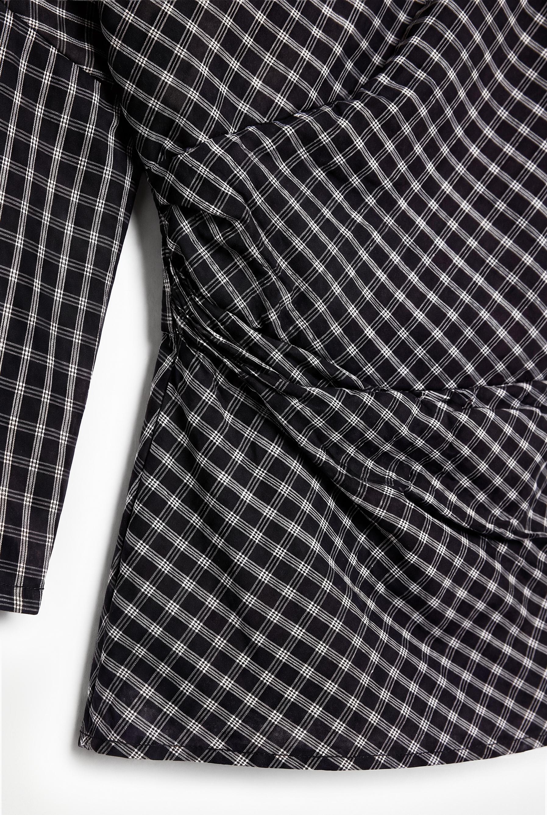 Asymmetric plaid top — BLACK