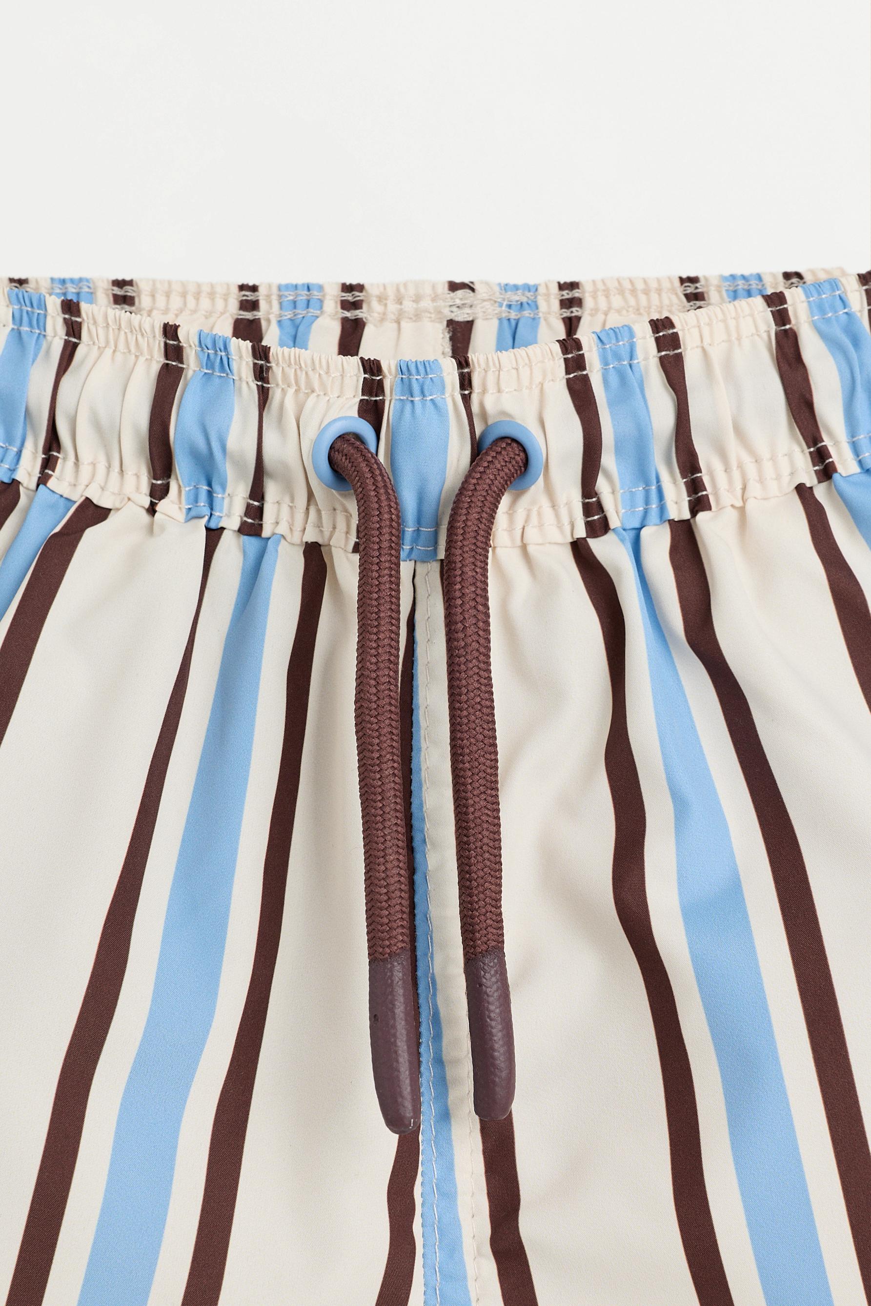 Baby Boy | Brown striped swim shorts — DEEP BLUE