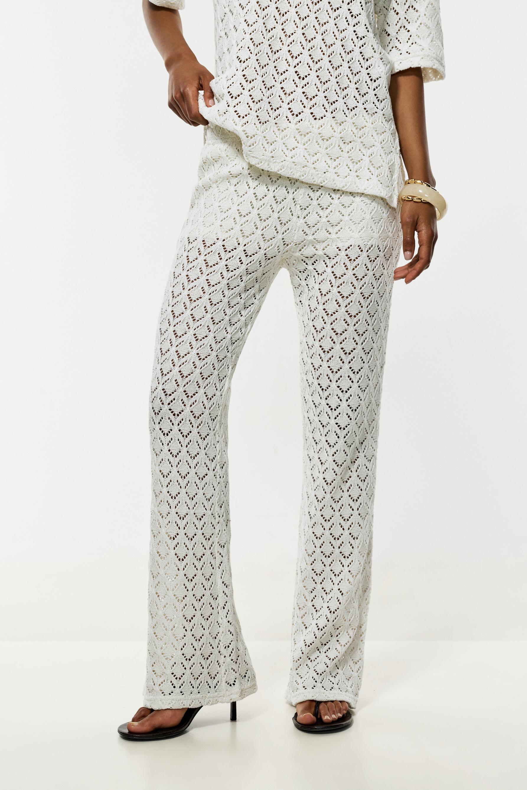 Crochet-effect bell bottom trousers — OFF WHITE