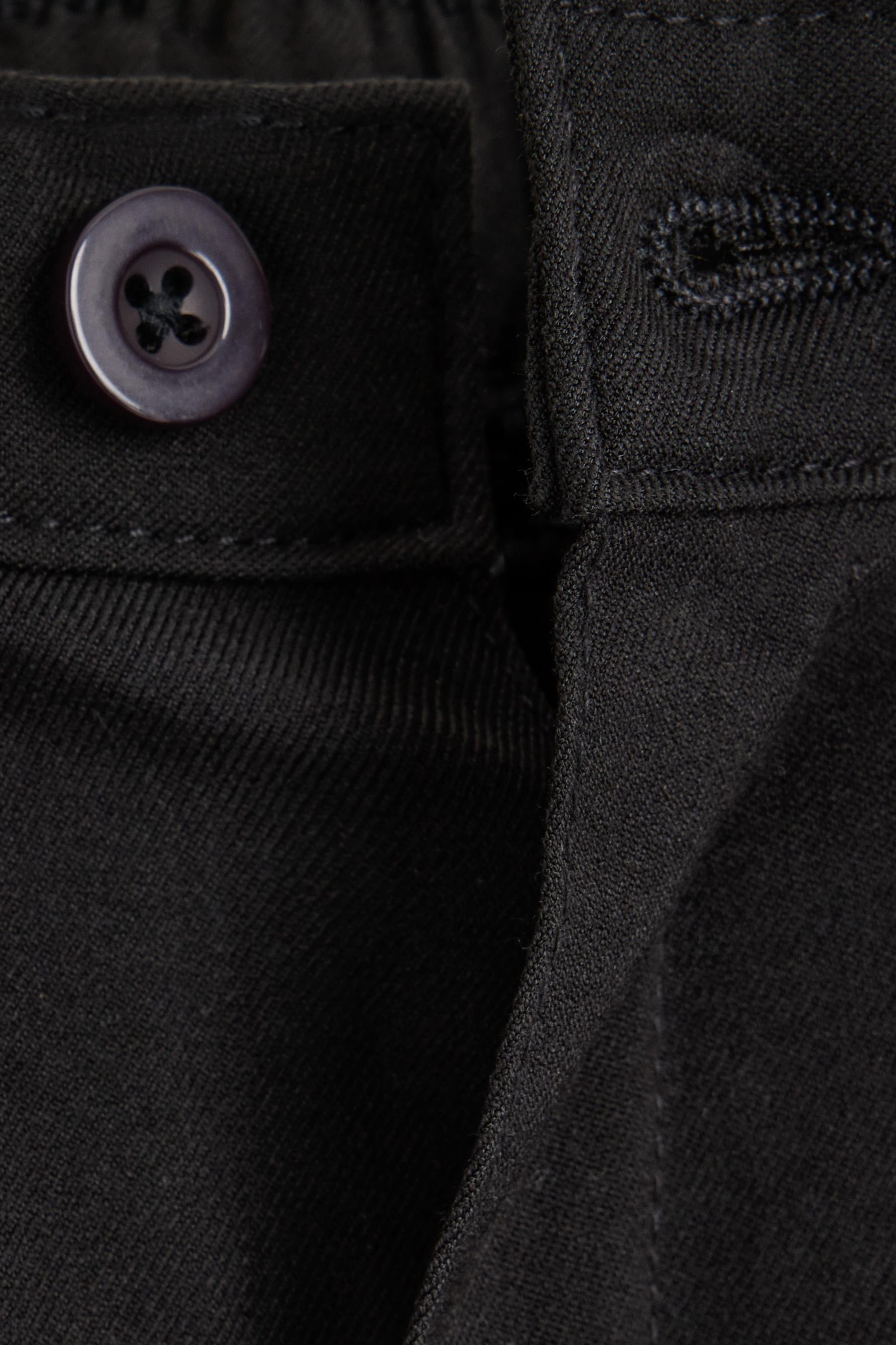 Pleated trousers — BLACK