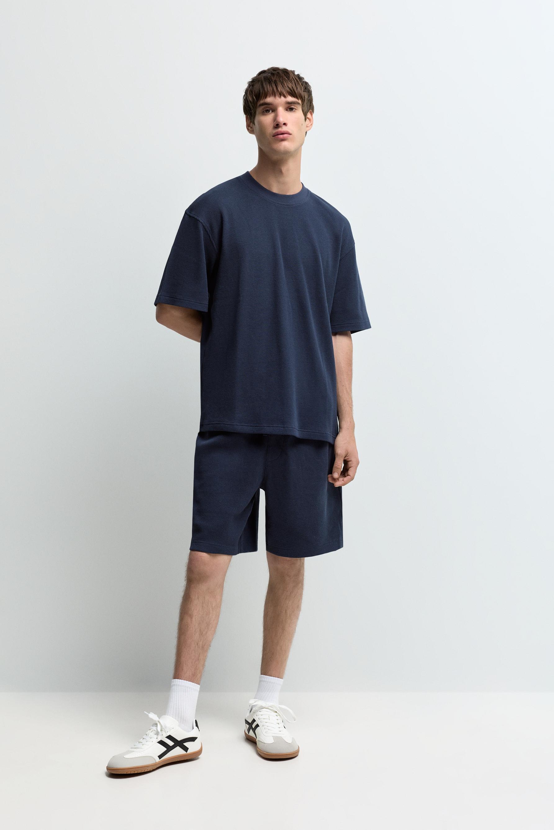 Waffle-knit textured Bermuda shorts — NAVY