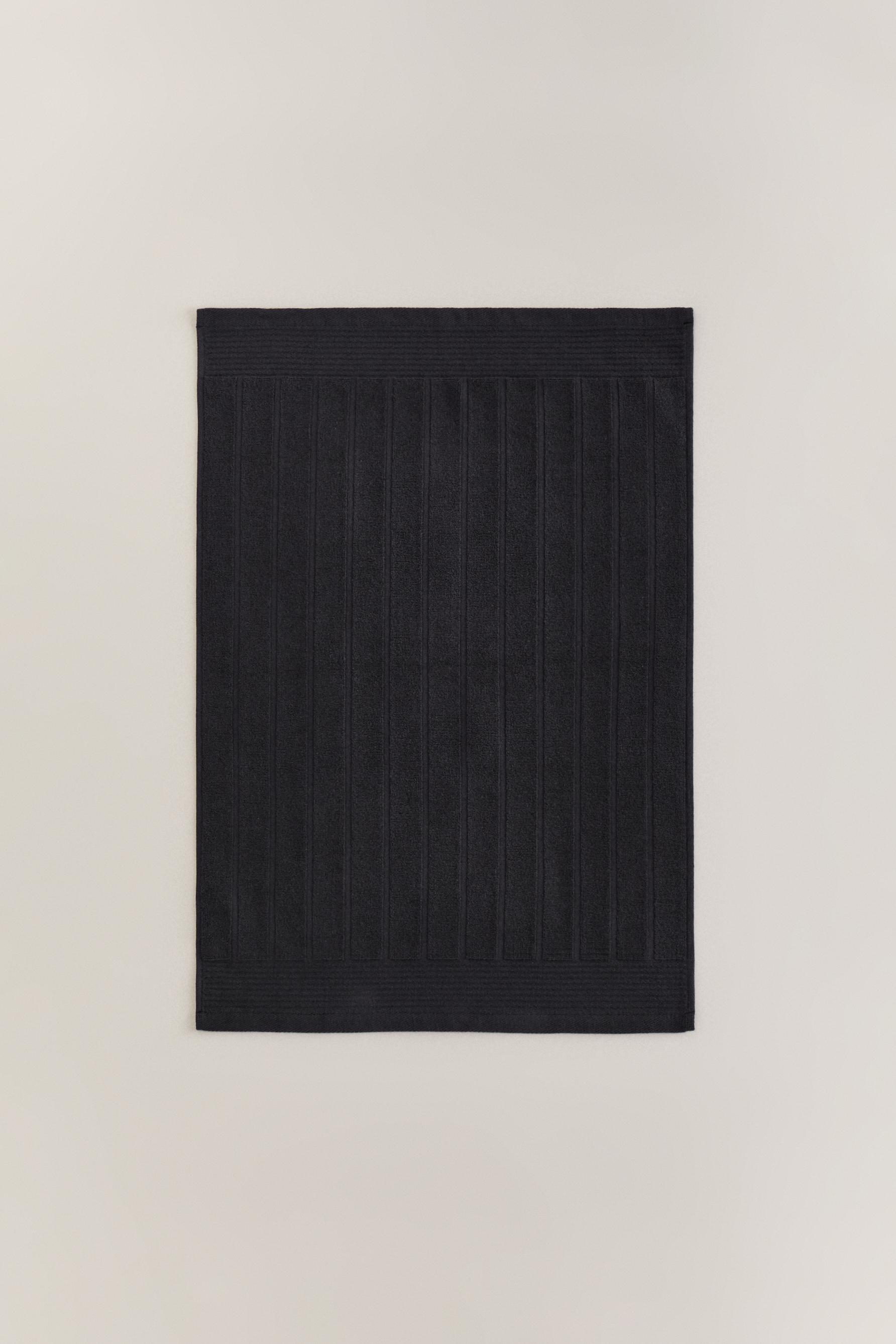 Alfombra de baño lisa 70 x 50 cm