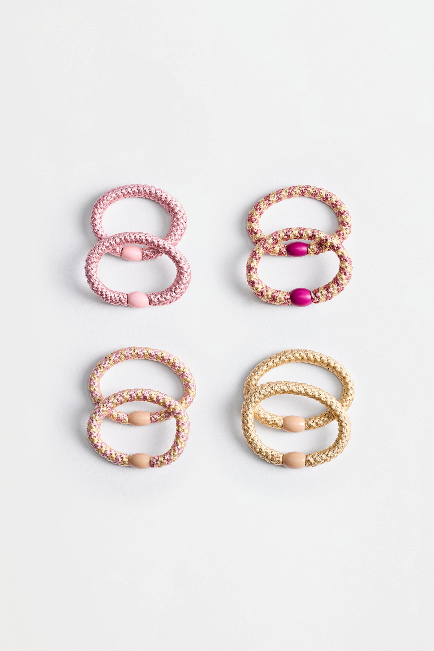 Coloured hair ties — VARIOUS