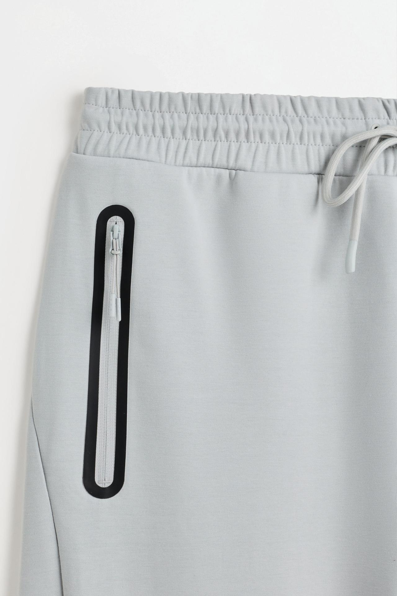 Wide-leg interlock trousers — GREY MARL