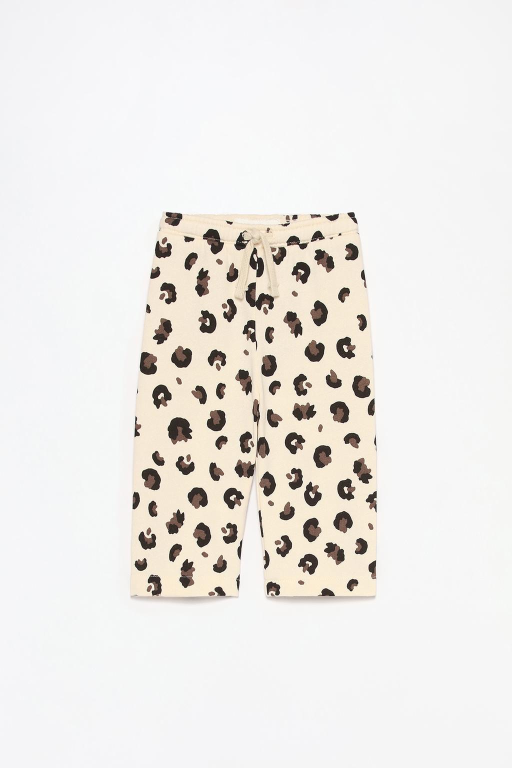 Calças wide leg felpa animal print