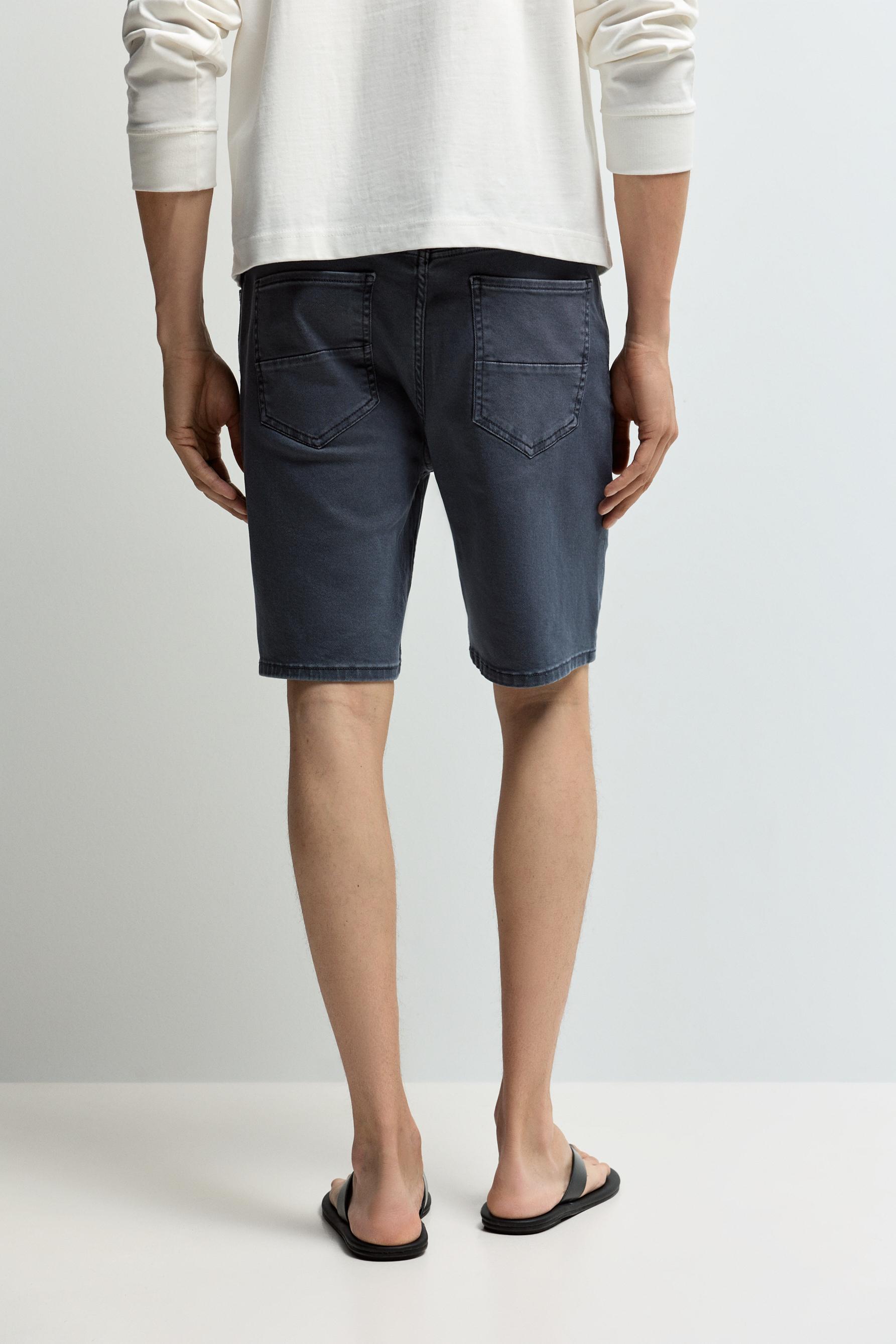 Slim denim Bermuda shorts — INDIGO