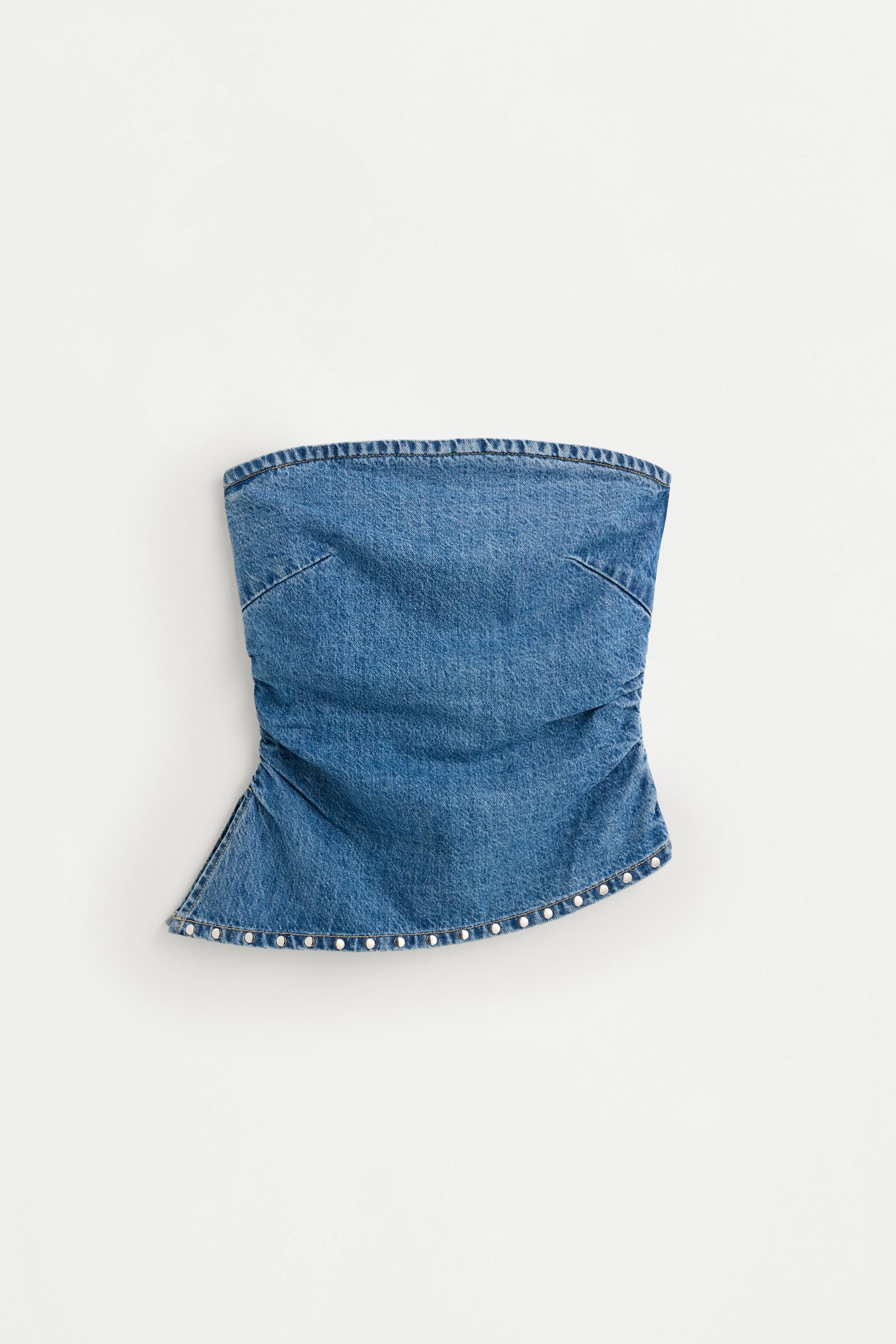 Asymmetric denim bandeau top with studs — PALE INDIGO