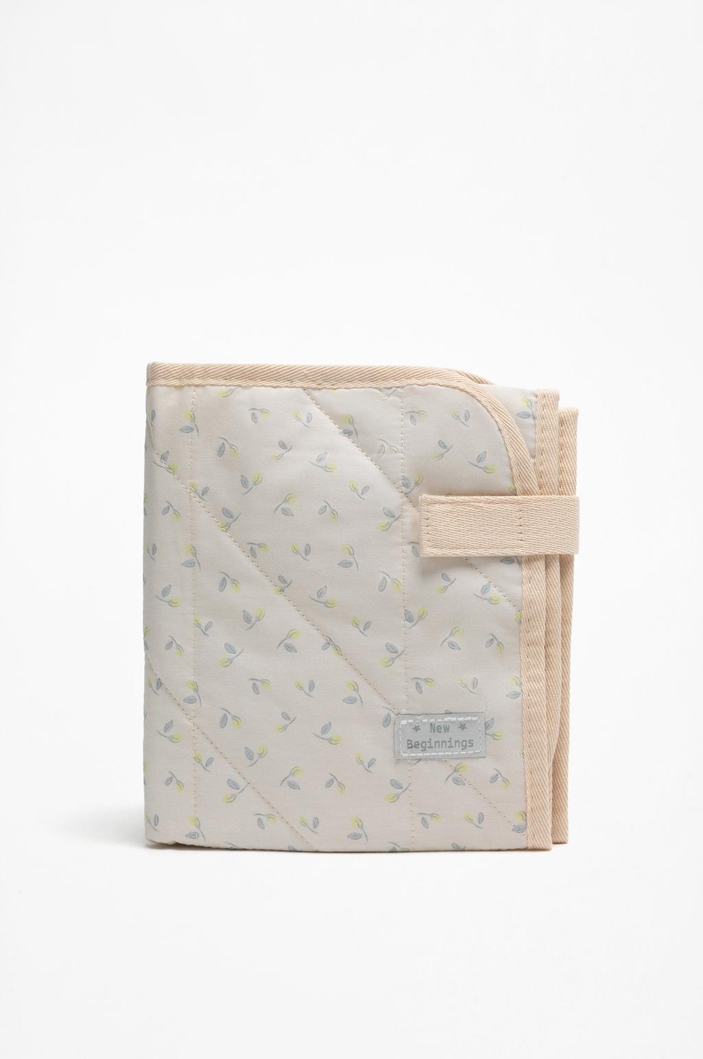 Quilted floral maternity changing mat