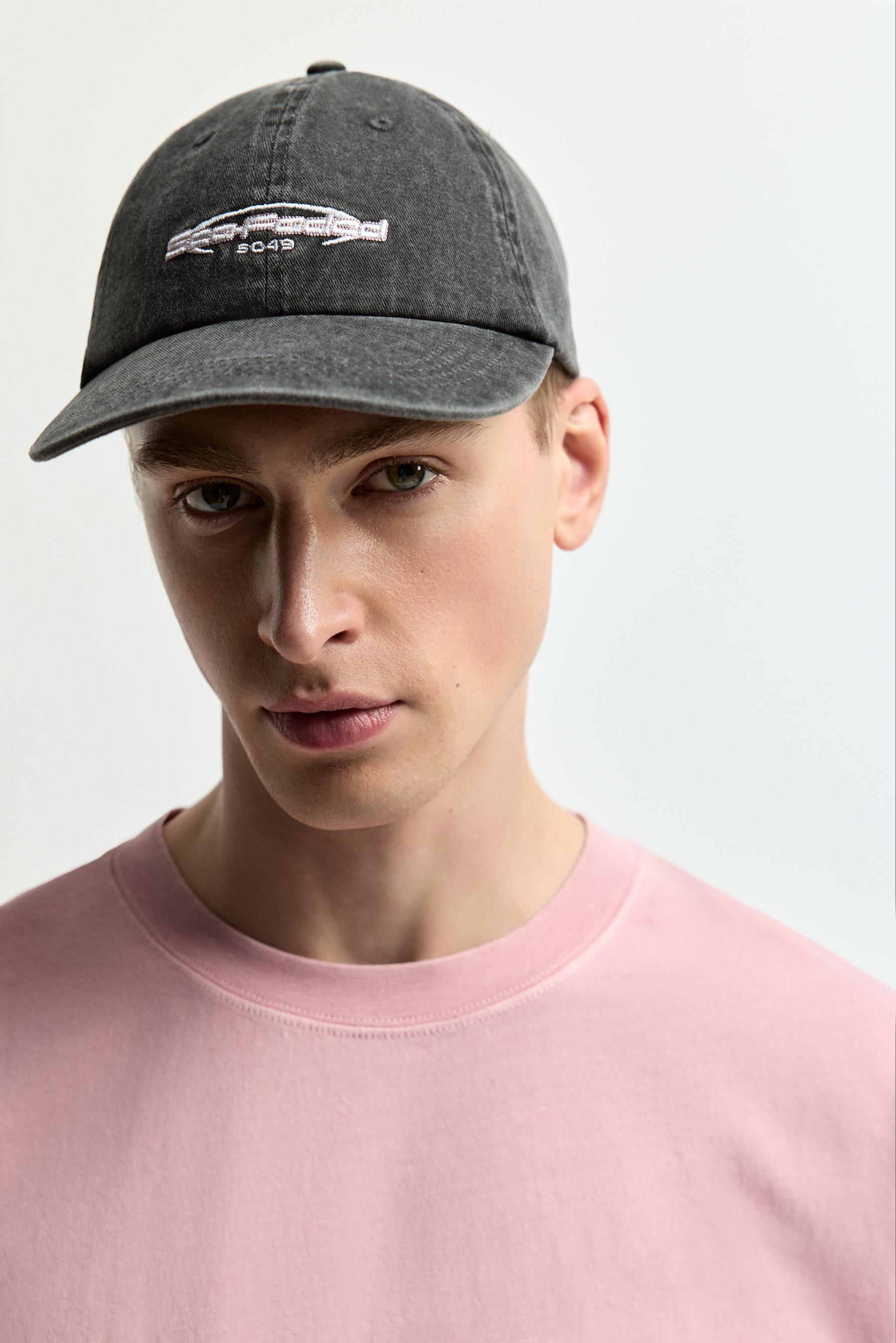 Faded-effect embroidered cap — BLACK