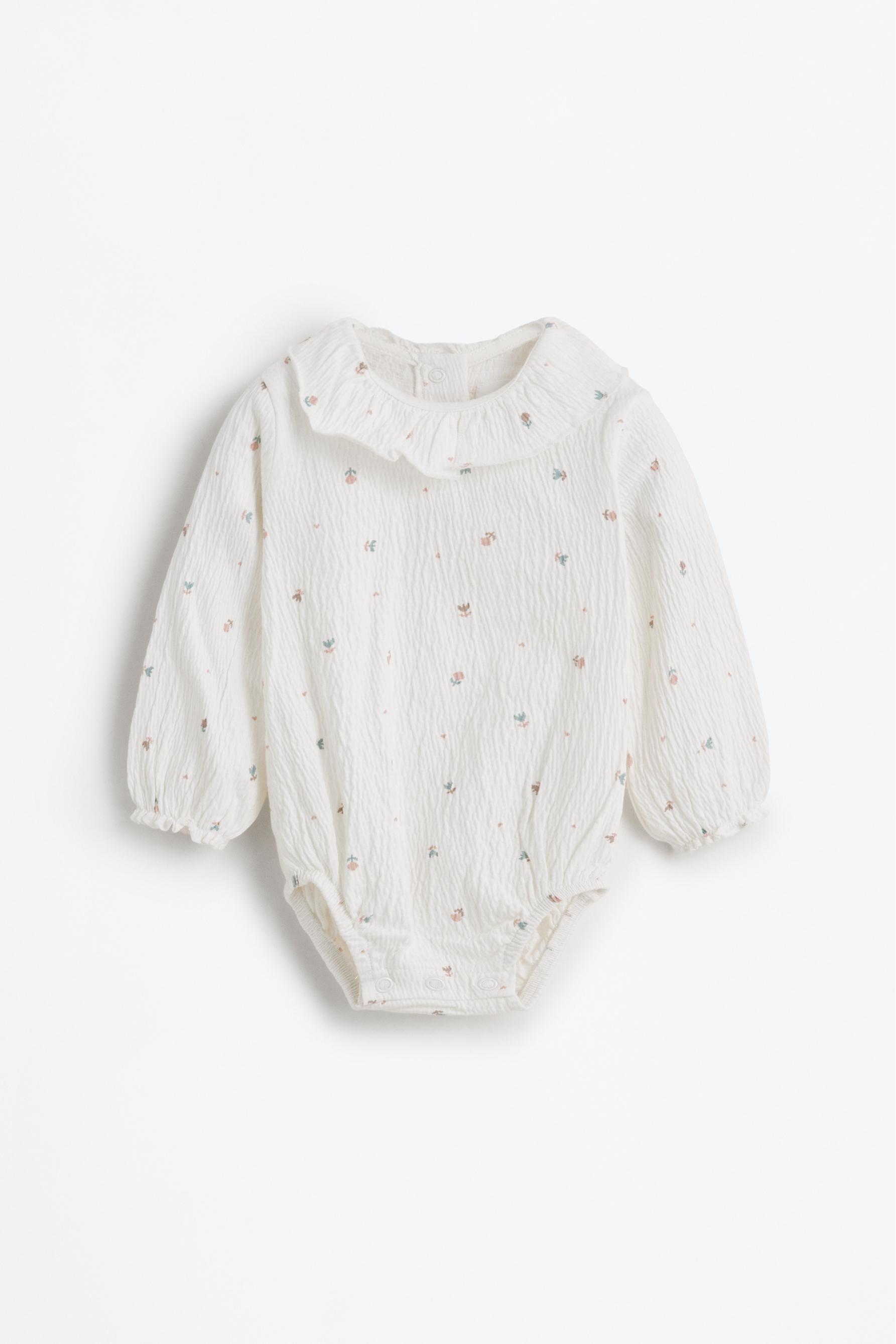 Body textura cuello volante