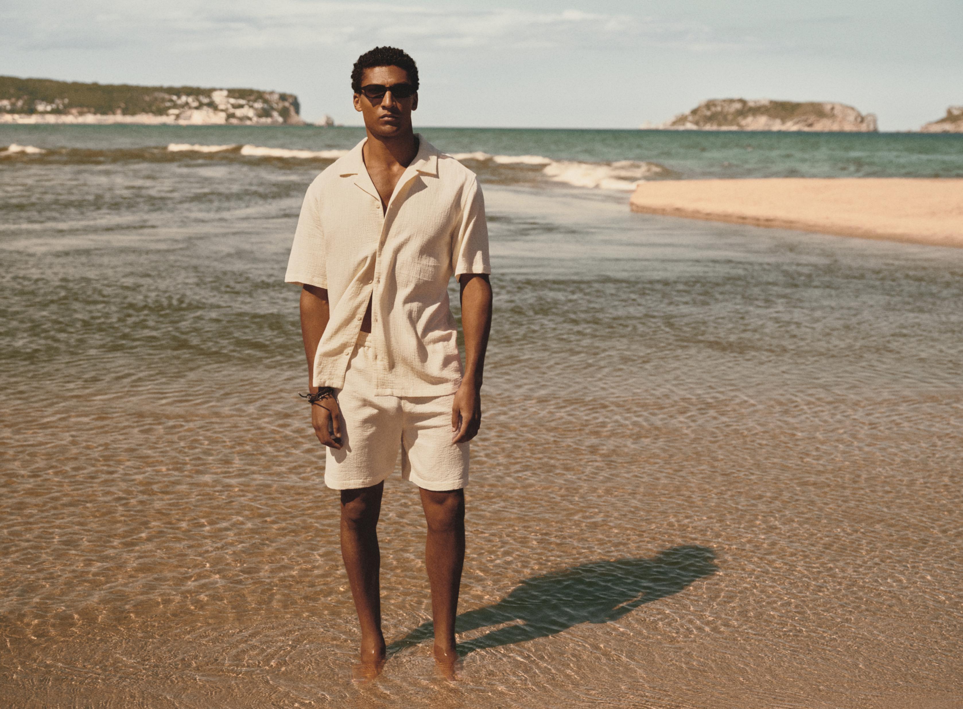 Waffle-textured Bermuda shorts — ECRU