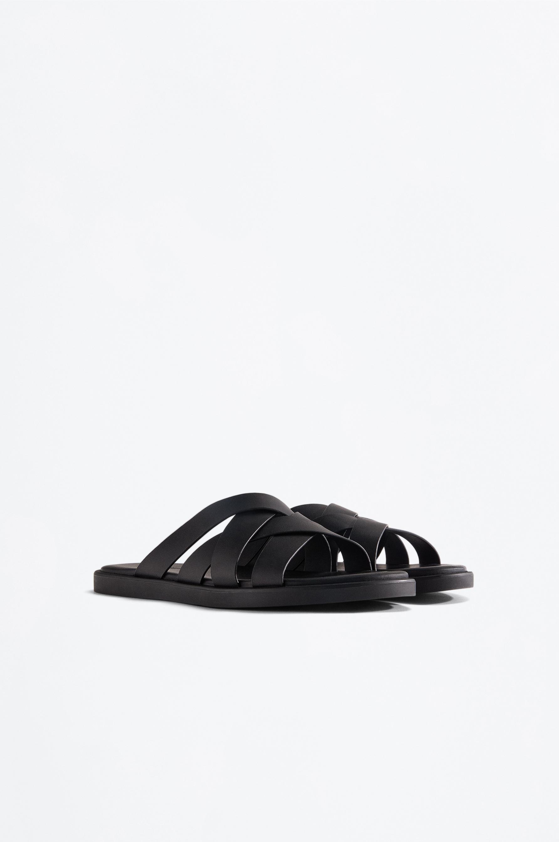 Cross-strap sandals — BLACK