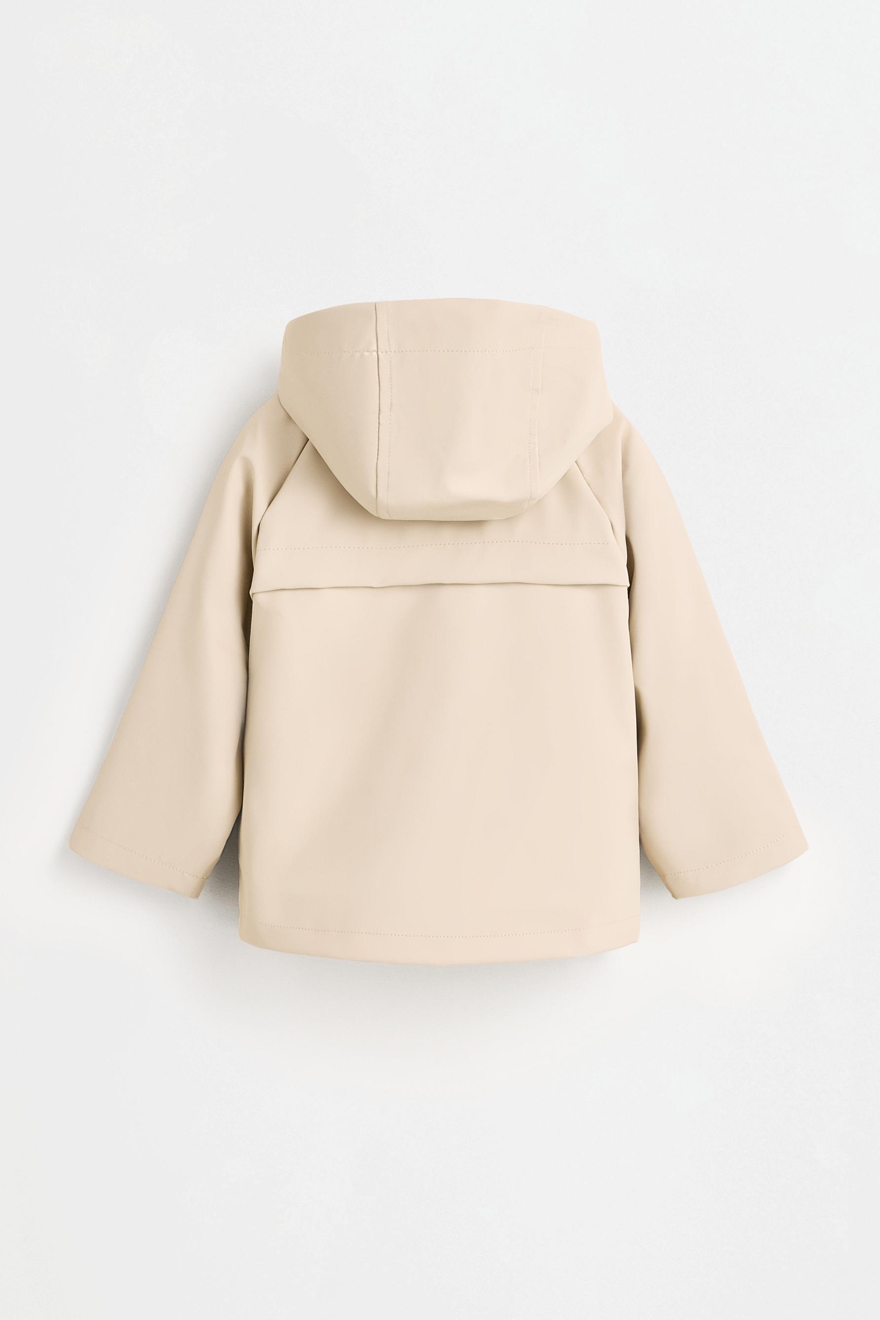Rubberised raincoat — BEIGE