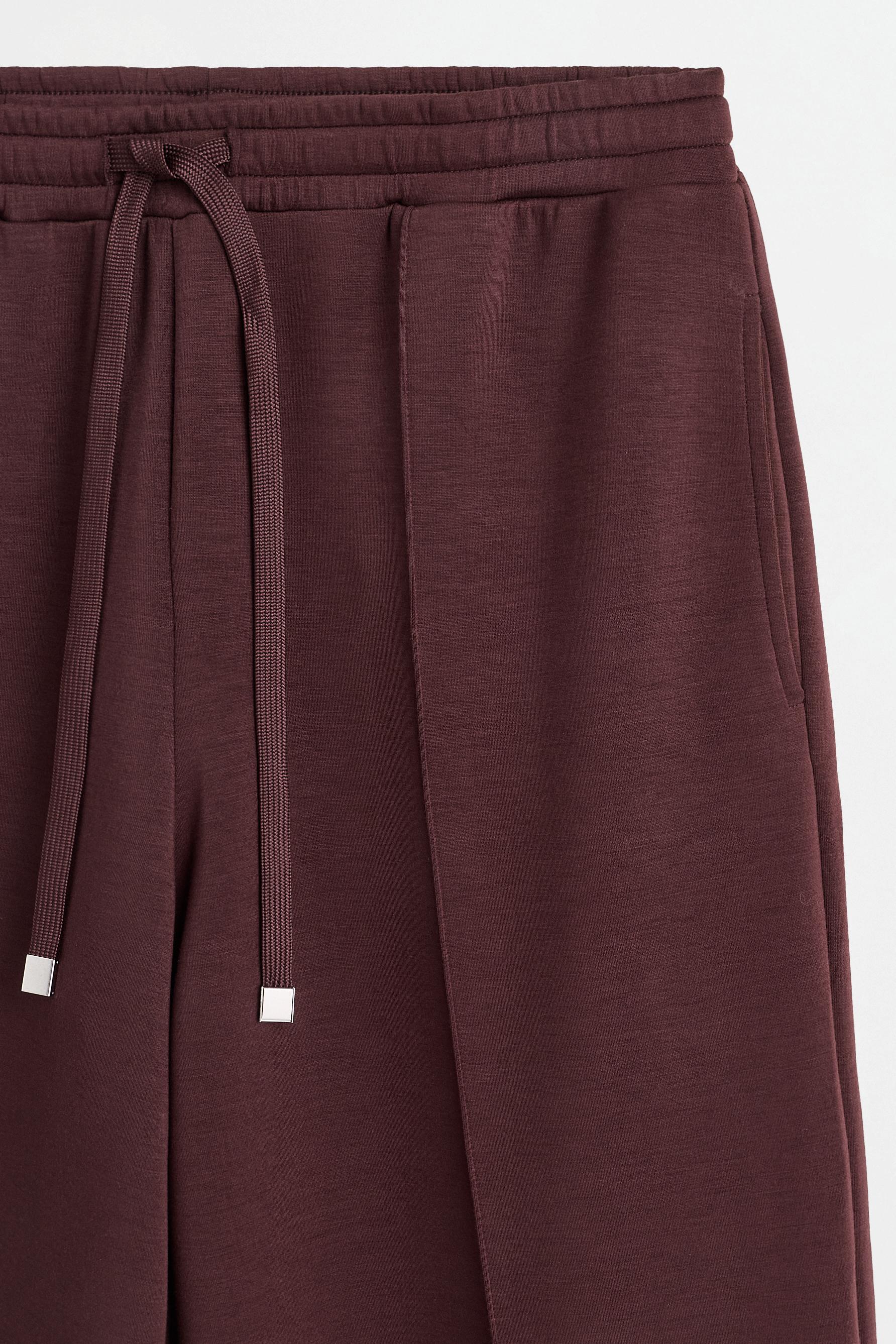 Wide-leg tracksuit trousers with front seam — WINE