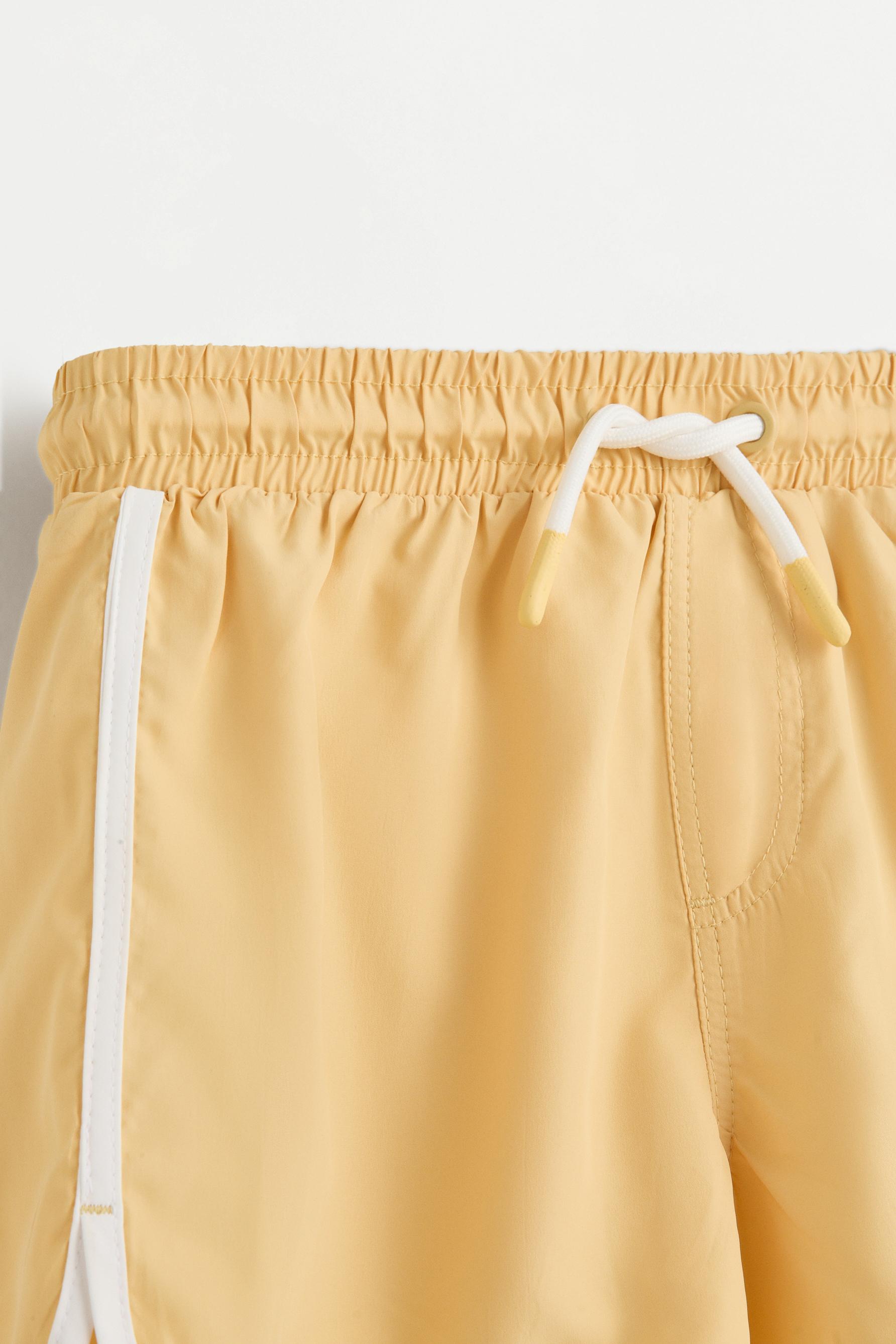 Contrast-line swim shorts — CURRY YELLOW