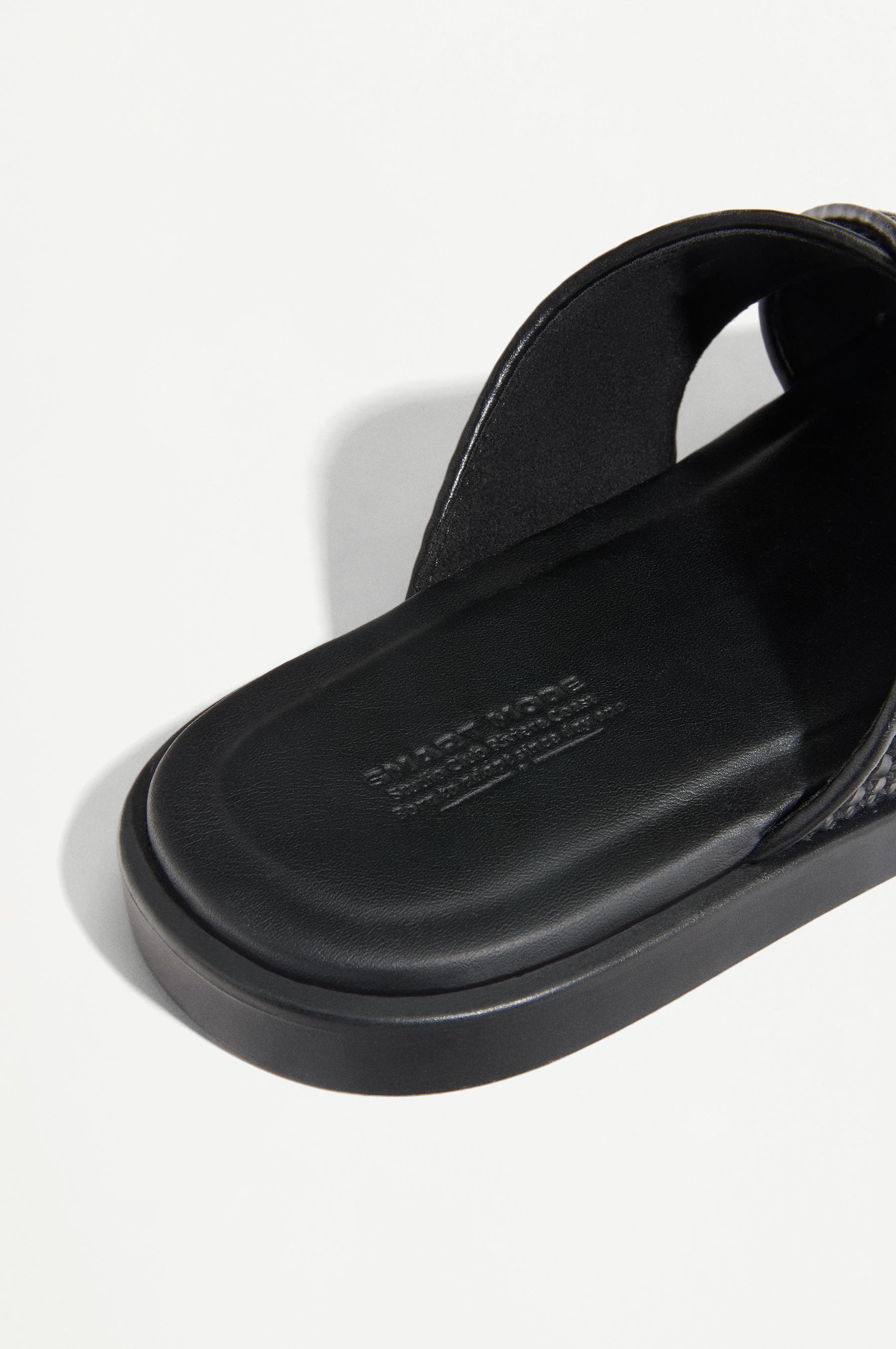 Crossed braided strap sandals — BLACK